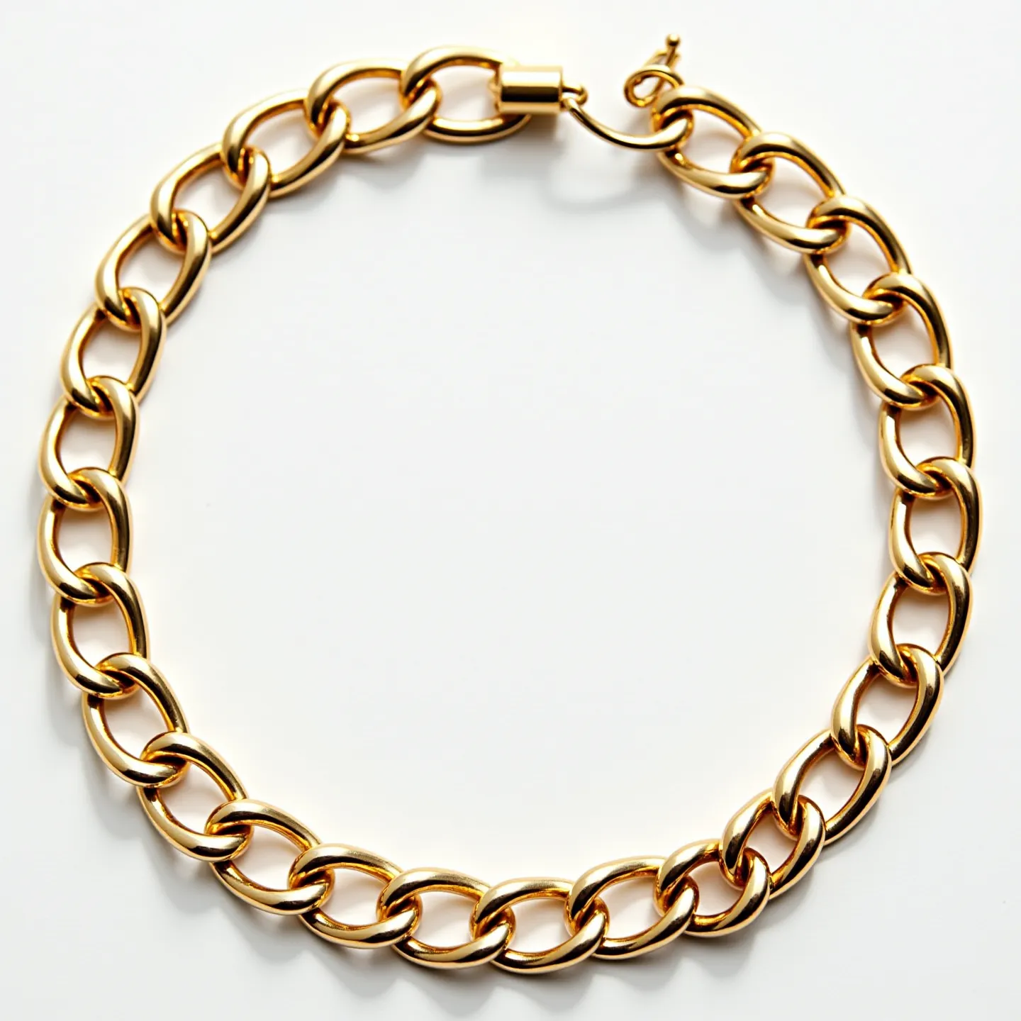 This Cuban link bracelet is crafted from a gold-toned material, featuring interlocking round-edged curb links that create a fluid and flexible appearance. It is designed with a clasp mechanism that ensures secure fastening, showcasing a polished finish that enhances its luxurious look. The bracelet utilizes a cylindrical clasp with a hook element, ensuring both security and ease of use. The consistent shine and uniform link design highlight a classic style associated with Cuban link jewelry.