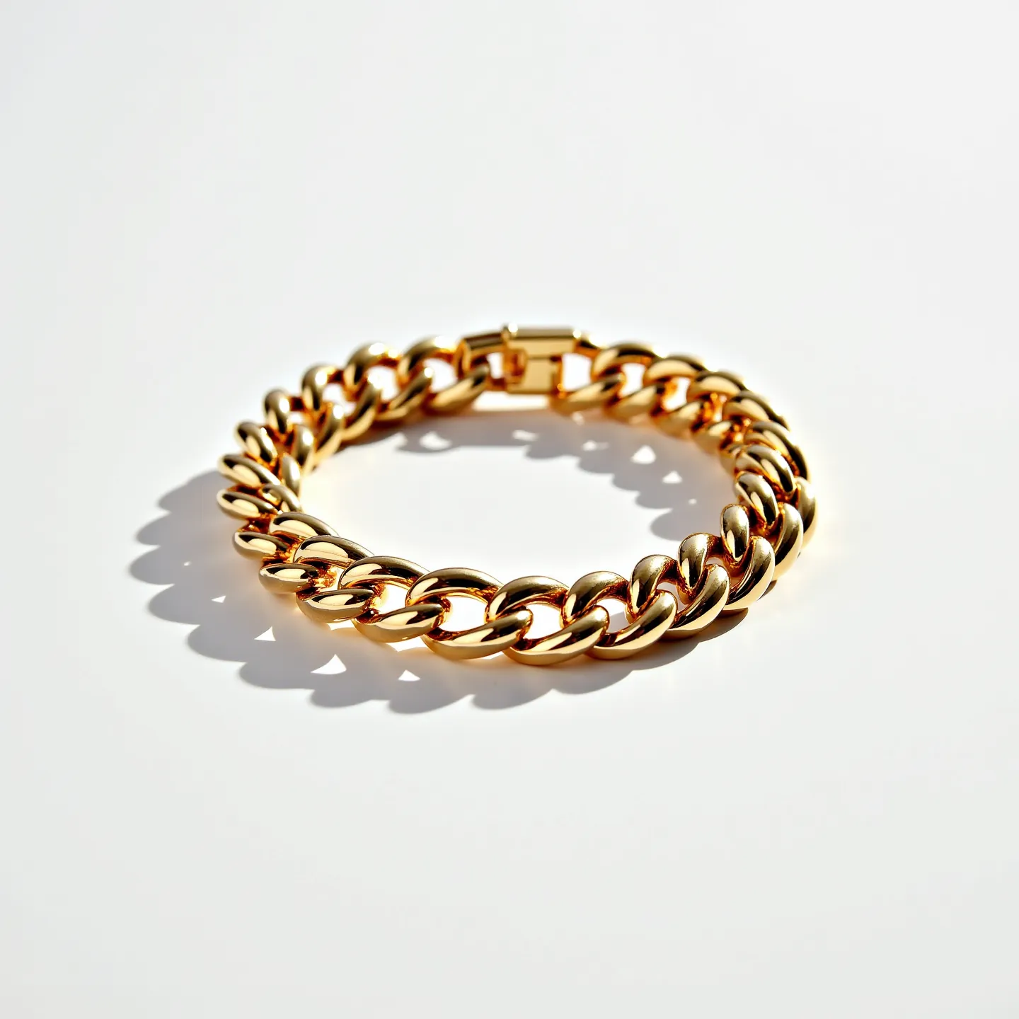 This cuban link bracelet features a series of interlocking links, all of which are crafted from a polished, shiny gold material. The bracelet showcases a refined and smooth surface with no visible gems or stones embedded within the links. The clasp is a box-style push clasp, ensuring a secure and seamless closure, maintaining the bracelet’s aesthetic appeal and uniform look.