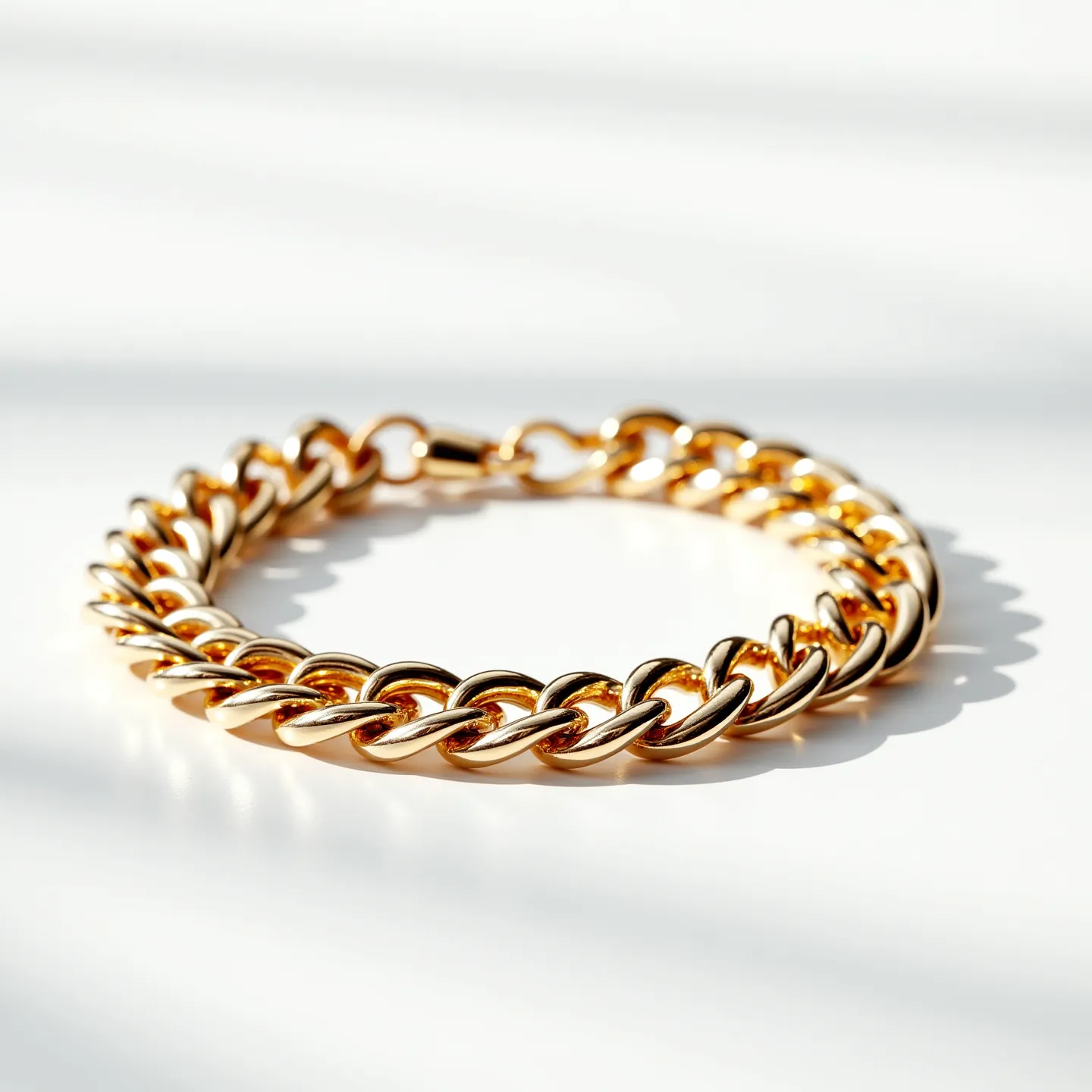 This cuban link bracelet is expertly crafted from high-polished gold, exhibiting a lustrous shine throughout its interlocking links. The bracelet features uniform, chunky links that are smoothly rounded, creating a bold and contemporary aesthetic. It is secured with a sleek and sturdy gold clasp designed to blend seamlessly with the links, ensuring both security and style. The gold material is consistent across the entire bracelet, and there are no additional gems or stones set within the piece, maintaining its refined and minimalist appeal.