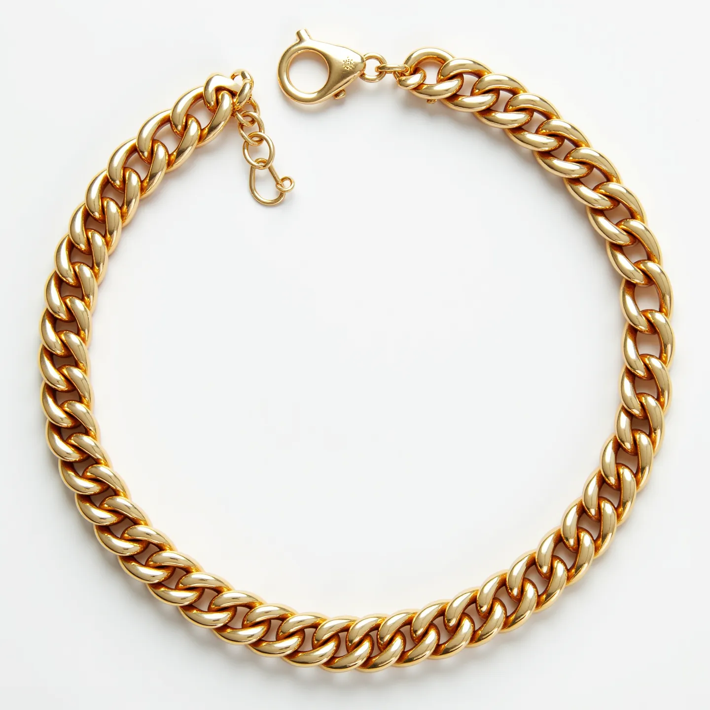 This Cuban link bracelet features a series of interlocking, polished gold links creating a thick, luxurious chain. The bracelet is equipped with a lobster clasp for secure fastening, along with a small chain extension for adjustability, providing flexibility in fit. The links are solid and substantial, exhibiting a classic and elegant style, perfect for a bold fashion statement. The gold material lends a timeless and versatile appeal, suitable for various occasions and outfits. Overall, this bracelet combines functionality with a sleek design, making it a valuable addition to any jewelry collection.