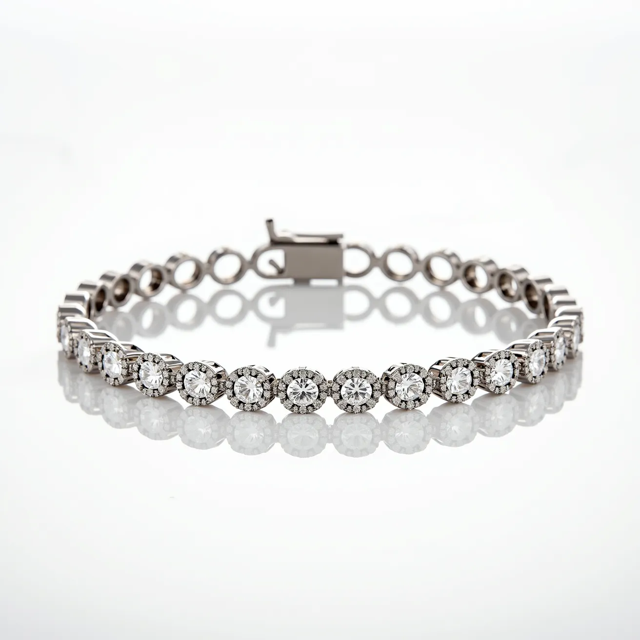 This diamond tennis bracelet features a series of round-cut diamonds set in a continuous line, each stone secured in place by a prong setting. The bracelet appears to be crafted from a high-quality metal, likely white gold or platinum, which complements the brilliance of the diamonds. The clasp is a box clasp with a side safety latch, ensuring a secure and elegant closure. The overall design showcases both the individual beauty of each diamond and the cohesive sparkle of the piece as a whole.