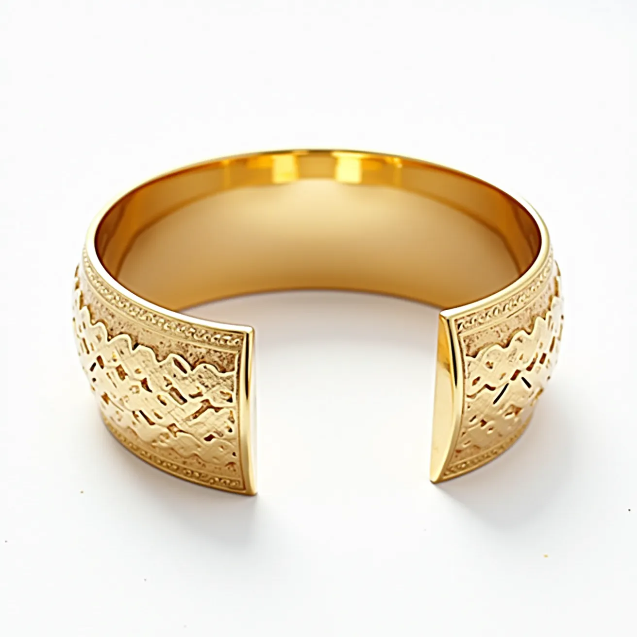 This gold cuff bracelet showcases a polished and elegantly curved design, crafted from a bright yellow gold material. The exterior features a detailed, textured pattern with raised, polished areas juxtaposed against recessed, matte sections, creating a dynamic visual contrast. There are no gemstones or additional adornments, allowing the intricate patterns and the sheen of the gold to take center stage. The bracelet is open-ended, providing a flexible fit without the need for a clasp or additional attachment, and its smooth, rounded edges enhance comfort and wearability.