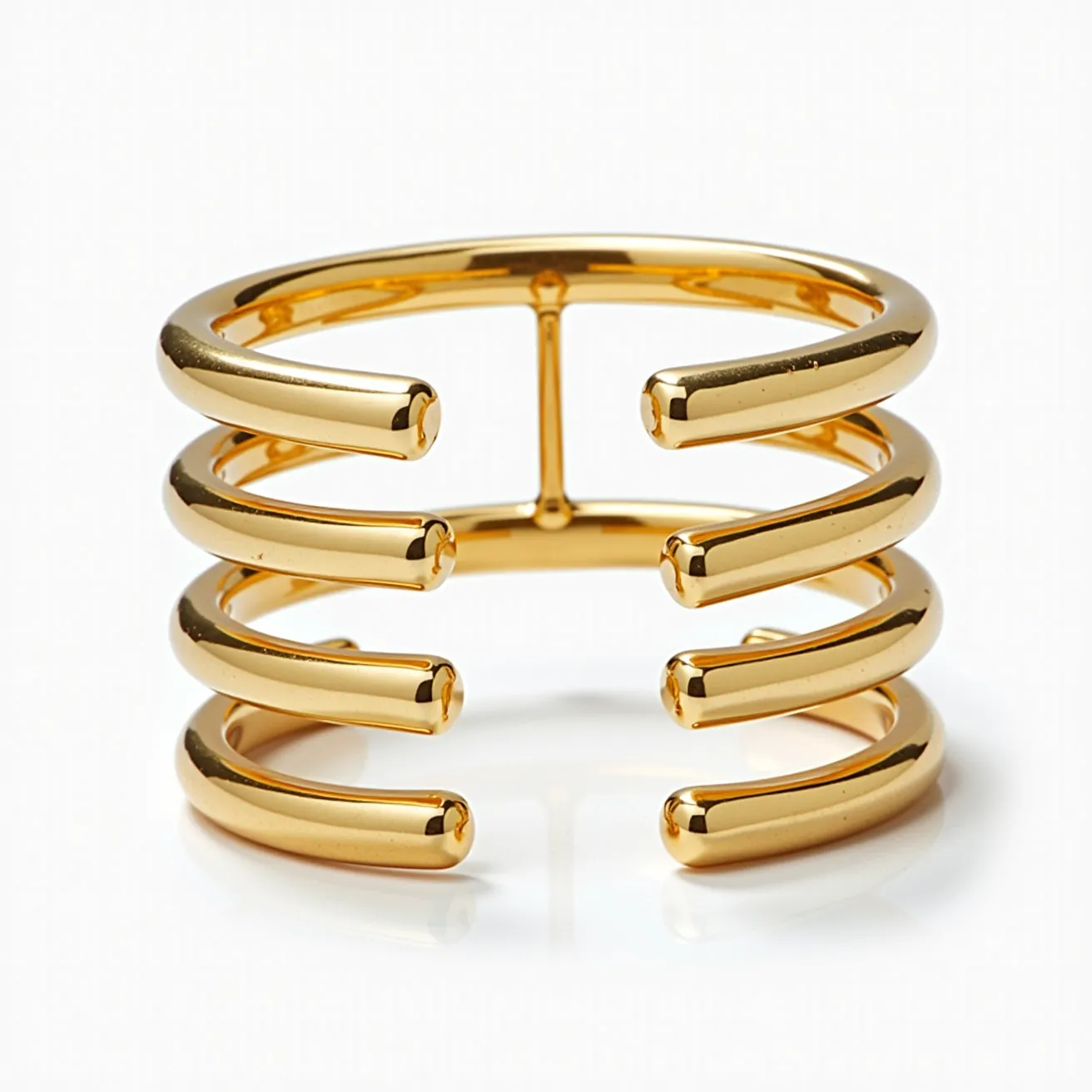 This gold cuff bracelet is crafted from polished metal, showcasing a sleek and modern design. It features open-ended segments that form a series of parallel, curved bars, providing a bold and contemporary appearance. The bracelet does not include any gemstones or intricate settings, relying solely on the polished gold finish for its elegant aesthetic. There is no visible clasp or attachment mechanism, adhering to the traditional cuff bracelet style, which allows for easy wearing by simply sliding it onto the wrist.