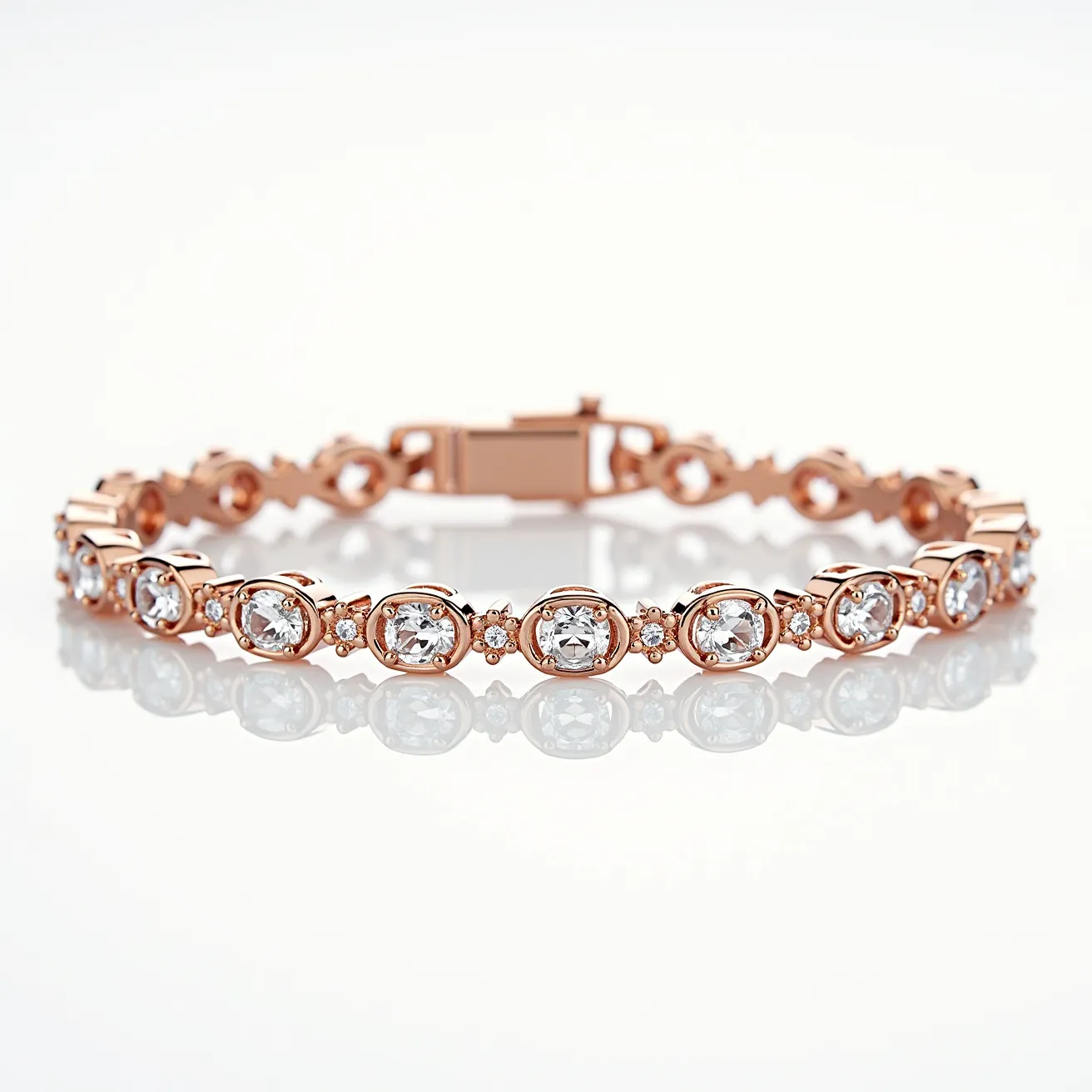 This gold tennis bracelet is elegantly designed, featuring rose gold links that seamlessly hold a series of sparkling gemstones. The gems, likely diamonds or high-quality cubic zirconia, are oval-cut and precisely set in a bezel setting, which enhances their brilliance and securely holds them in place. Each oval gem is flanked by smaller round stones, adding an extra touch of sparkle and continuity to the design. The bracelet is equipped with a secure clasp, ensuring it stays fastened comfortably on the wrist.