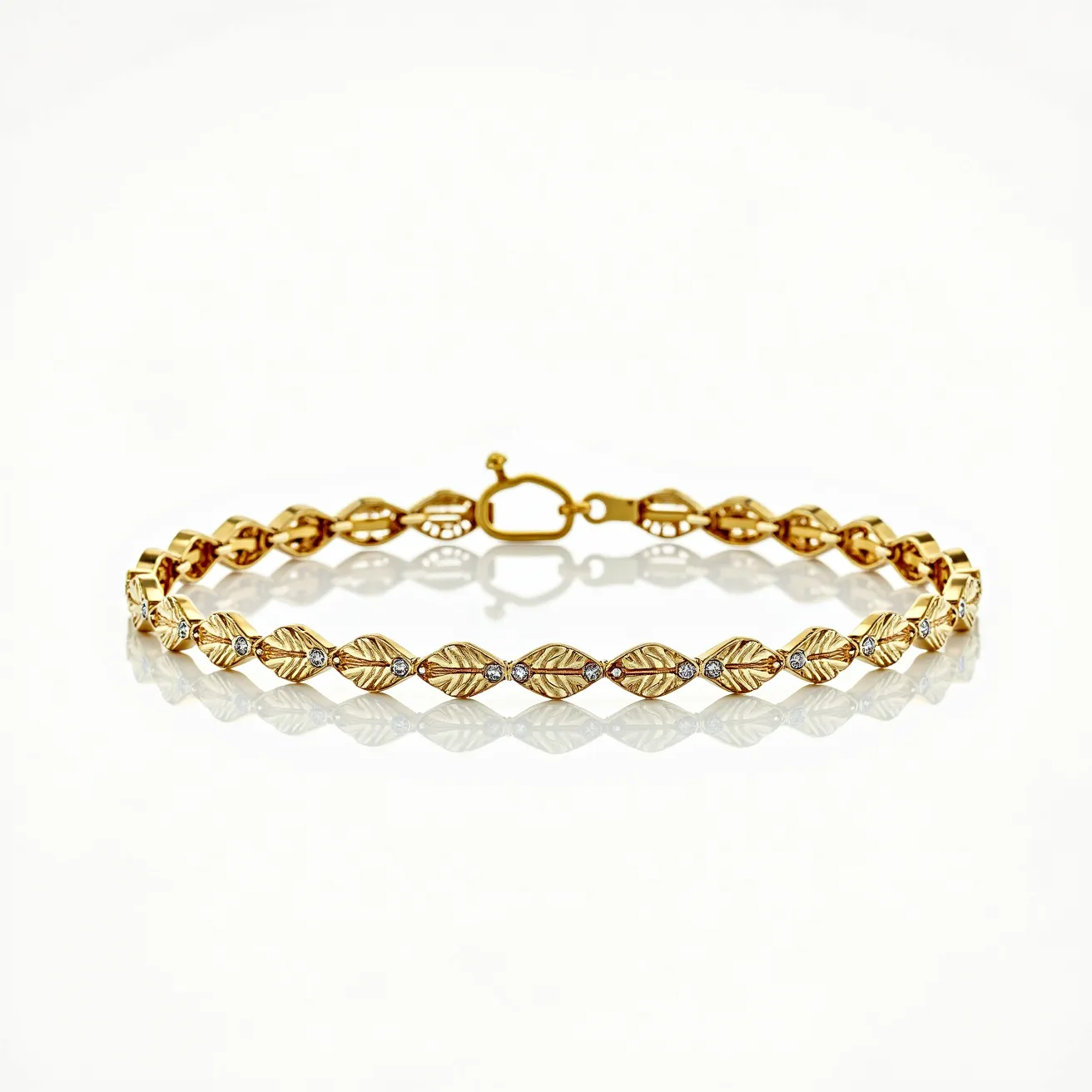 This gold tennis bracelet features an intricate design composed of interlocking, leaf-shaped links. Each leaf-shaped link is meticulously crafted from polished gold and accented with a small round-cut diamond securely set in the center. The diamonds add a subtle sparkle to the bracelet, enhancing its elegance. The bracelet is finished with a sturdy gold clasp that ensures a secure and comfortable fit for the wearer.