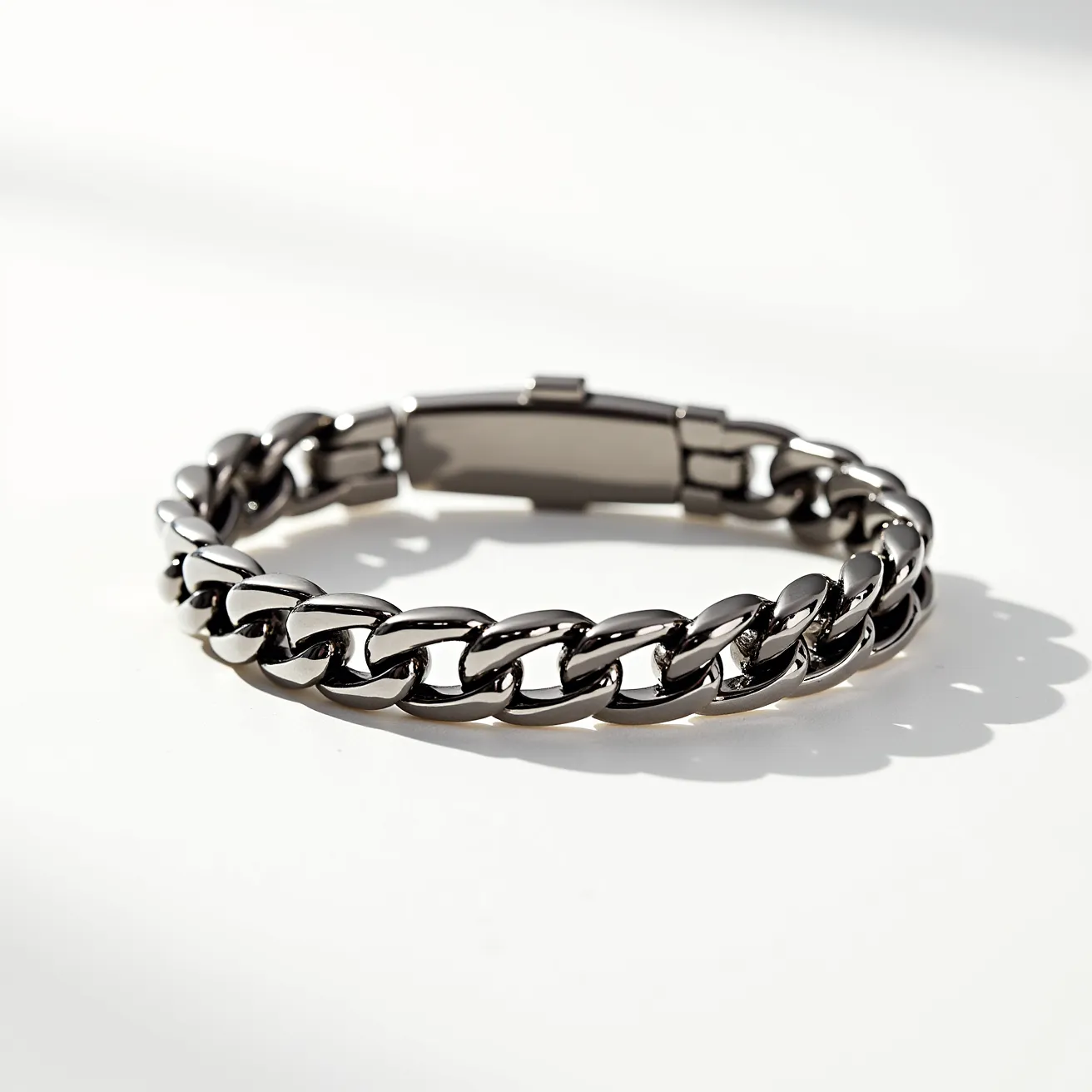 This men's bracelet features a robust design made from polished stainless steel links, forming a sleek and stylish chain. The bracelet is fitted with a secure box clasp, offering both ease of use and additional security when worn. The steel material provides a durable and modern aesthetic, ensuring longevity and resistance to tarnish or corrosion. Overall, this bracelet combines functionality with contemporary style, making it an ideal accessory for a sophisticated yet rugged look.