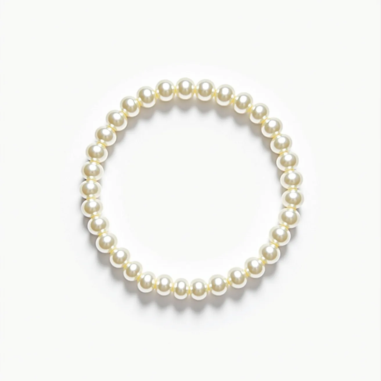 This pearl bracelet features a continuous strand of lustrous, round pearls that are evenly matched in size. The pearls are arranged in a classic and timeless design, with each pearl in close proximity to the next, creating a uniform and elegant appearance. The bracelet appears to be strung together without a visible clasp or attachment, suggesting it may be elastic for ease of wear. Each pearl exhibits a high-quality sheen, indicative of a well-crafted piece of jewelry. The overall design showcases simplicity and sophistication, making it a versatile accessory for various occasions.