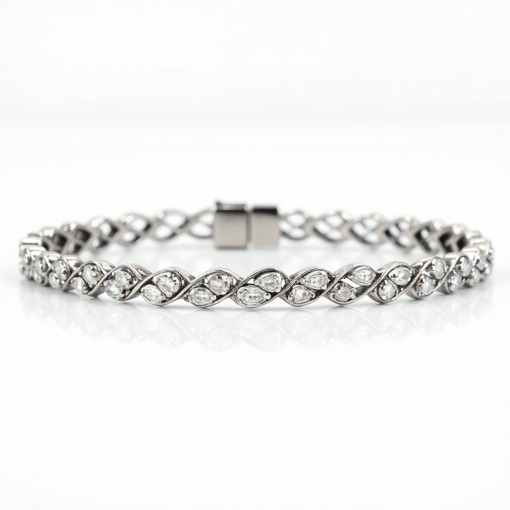 This tennis bracelet features a meticulously designed pattern, crafted from what appears to be a polished metal, most likely white gold or platinum, creating an elegant and sparkling effect. The bracelet is adorned with numerous oval-cut diamonds, each set securely in a delicate prong setting that enhances their brilliance while ensuring they remain in place. The diamonds are arranged in a continuous flow, giving the bracelet a seamless and luxurious appearance. The piece is fastened with a box clasp, which provides both security and ease of use, while maintaining the bracelet's refined aesthetic. This combination of precious materials and expert craftsmanship results in a stunning piece that exudes sophistication and timeless appeal.