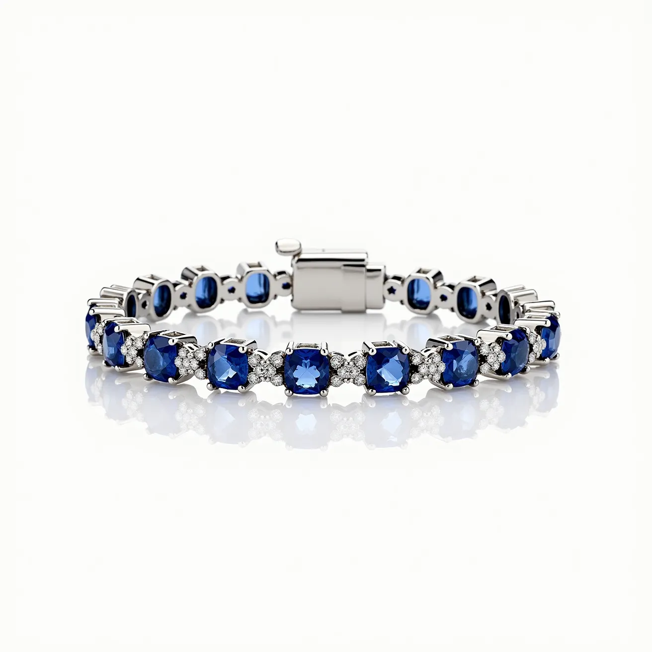 This tennis bracelet features a series of vibrant blue sapphires and sparkling diamonds. The sapphires are cushion-cut, set in a four-prong setting, and alternated with round brilliant-cut diamonds also in a prong setting. The bracelet appears to be crafted from white gold, adding a sleek and elegant backdrop to the blue and white gemstones. There is a secure box clasp with a safety latch, ensuring that the bracelet stays fastened during wear. The combination of the rich blue sapphires and the dazzling diamonds creates a classic and luxurious piece of jewelry.