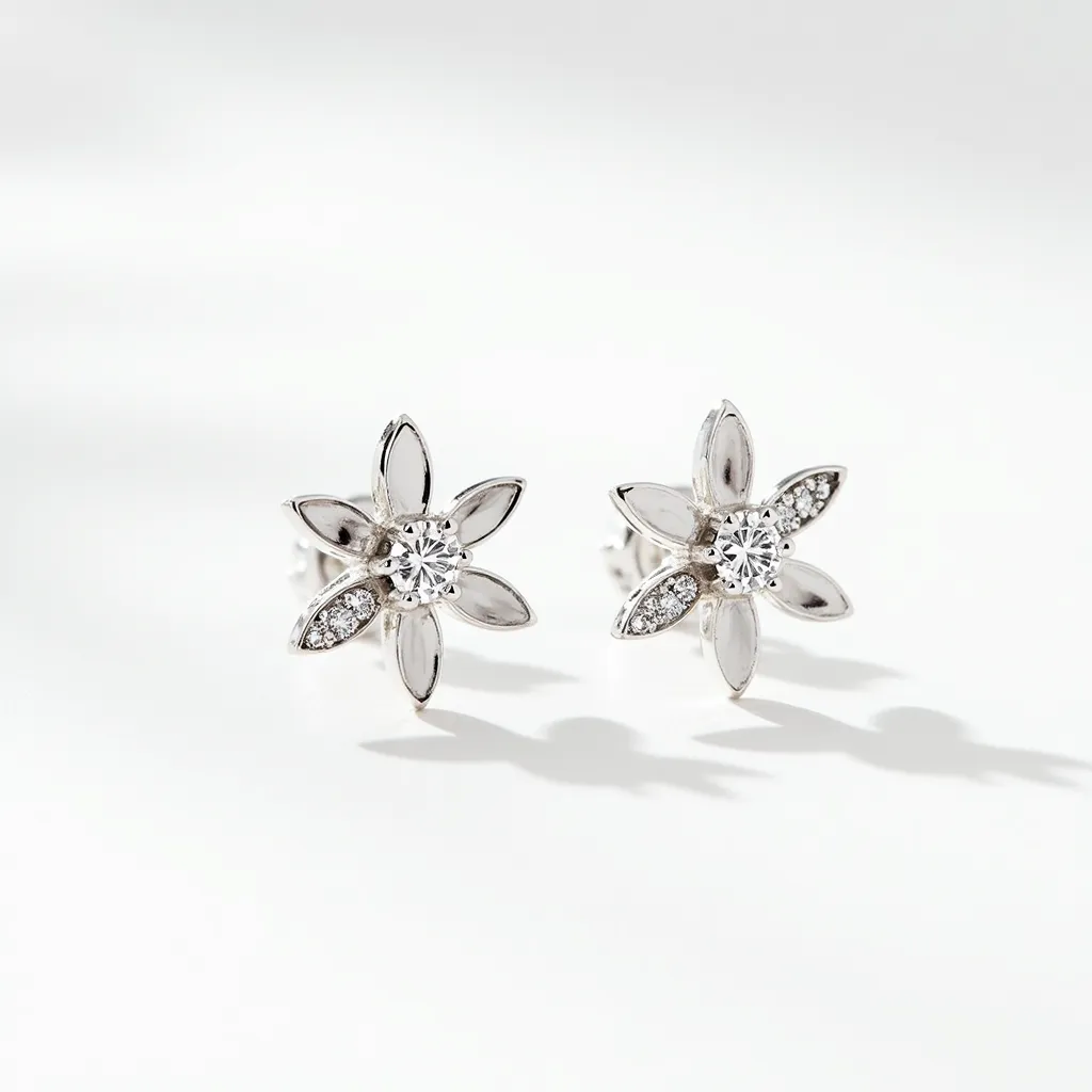 These floral stud earrings feature a delicate flower design crafted from a lustrous metal, likely silver or white gold, creating a sleek and polished look. Each earring has a central round-cut gem, possibly a diamond, secured in a prong setting that enhances its brilliance and sparkle. The petals are intricately detailed and each contain a row of smaller round-cut stones, enhancing the design's elegance and depth. The earrings are fitted with standard post and butterfly back clasps, ensuring a secure and comfortable fit for the wearer.