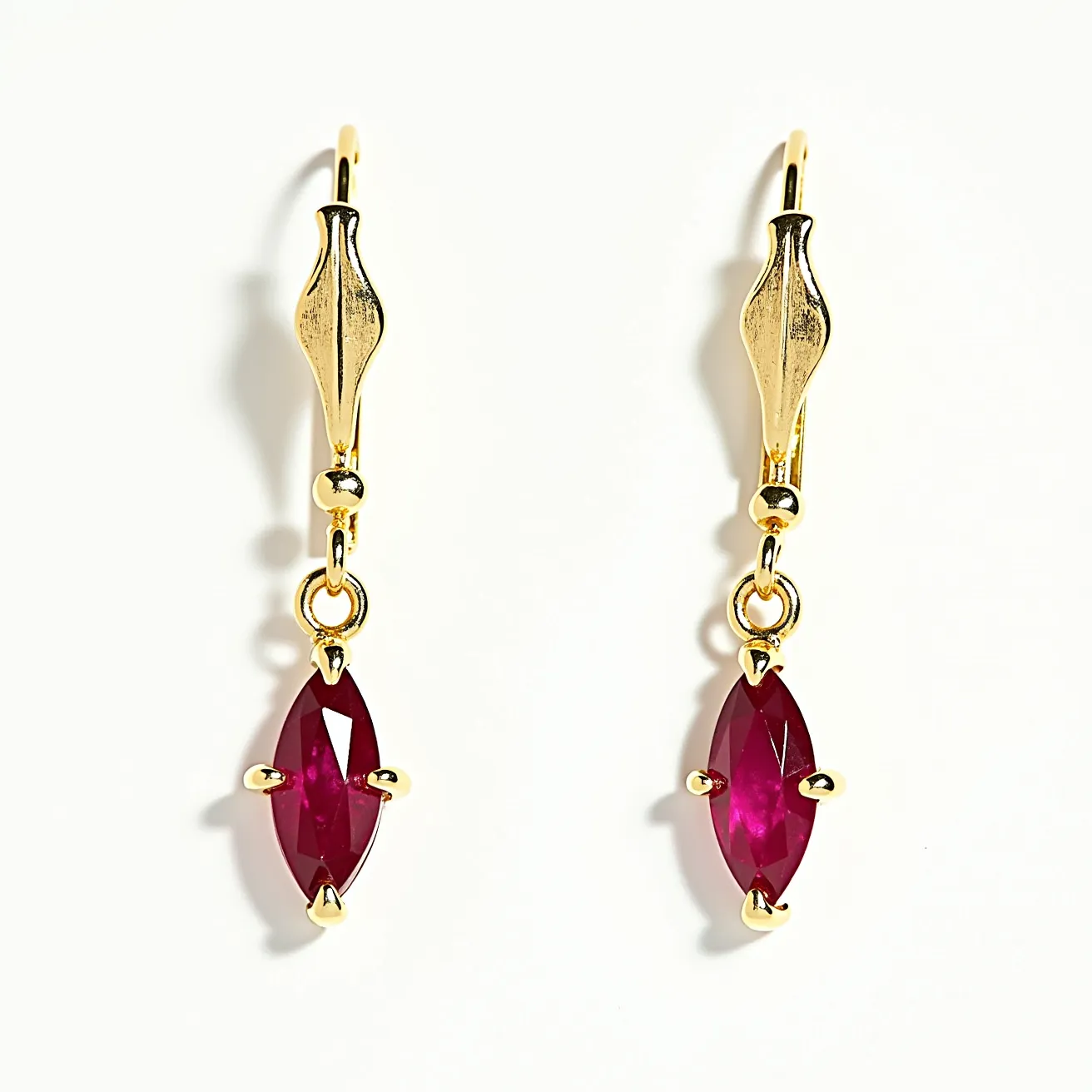 These gold dangle earrings feature a sleek design, crafted from a polished gold material. The focal point of the earrings is a marquise-cut gemstone, resembling a ruby, which is set in a prong setting that secures the stone while allowing maximum light exposure. The stone's rich hue complements the warm tone of the gold. The earrings are attached with a lever-back clasp, providing both security and ease of wear. The combination of the vibrant gemstone and the elegant gold structure creates a luxurious and timeless appeal.