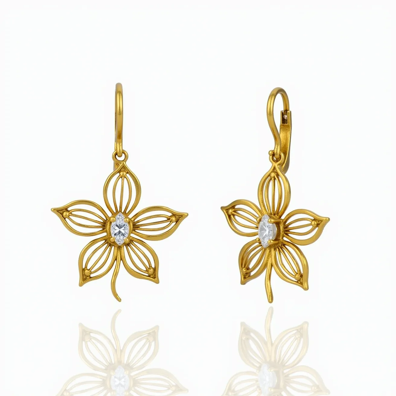 These gold flower earrings feature an elegant floral design crafted from a warm, rich gold. Each earring showcases a sparkling, marquise-cut clear gemstone set at the center, enhancing the delicate filigree petals that form the flower. The gemstones are prong-set, ensuring security while adding an extra touch of sophistication to the design. The earrings are equipped with a hook clasp, allowing for easy and secure attachment. The overall design highlights a blend of intricate craftsmanship and timeless elegance.