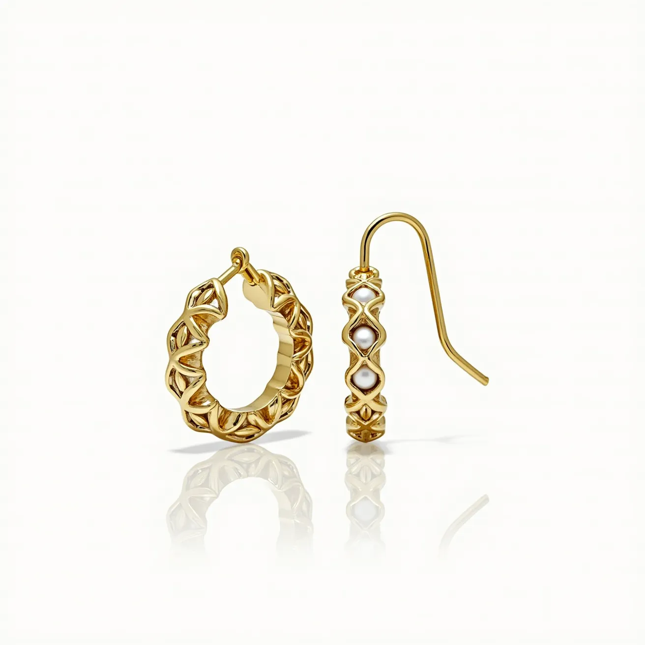 These loop earrings are crafted from a lustrous gold material, featuring an intricate, openwork design that creates a textured, decorative pattern. Within the geometric shapes, the earrings are adorned with small, round pearls, each set securely within the contours of the gold lattice, enhancing their elegant appearance. The pearls are consistently spaced, adding symmetry and cohesion to the overall design. These earrings use a hinged hoop clasp for a secure closure, ensuring they remain comfortably fastened when worn. The combination of gold and pearls gives these earrings a classic and sophisticated allure.