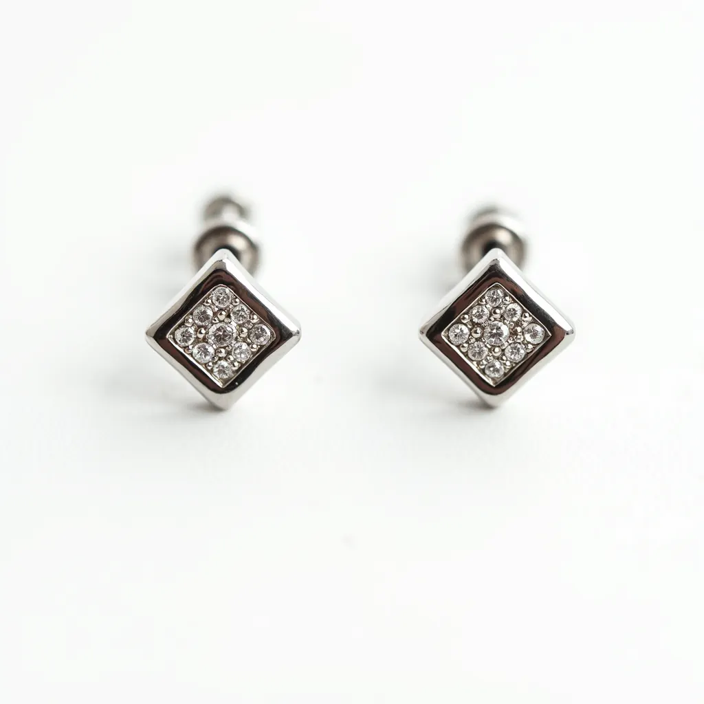 These men's earrings feature a square design with a central cluster of small, round-cut gems that resemble diamonds, likely set in a prong setting to enhance their brilliance. The earrings appear to be crafted from a polished silver-toned metal, providing a sleek and sophisticated appearance. The attachment mechanism seems to involve a screw-back or push-in clasp, ensuring a secure fit when worn. The overall look is elegant yet modern, making these earrings suitable for various occasions.