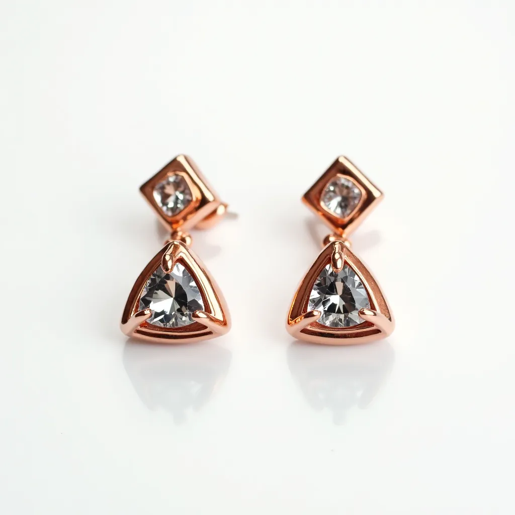 These moissanite earrings feature a visually appealing design with a combination of geometric gemstones set in a rose gold-colored metal. Each earring showcases a square-cut moissanite stone at the post, which connects to a dangling triangular-cut moissanite gem. The setting is an elegant bezel style that encircles the stones, providing a modern yet sophisticated look. The earrings are secured with a post and butterfly back clasp, ensuring a snug and comfortable fit when worn.