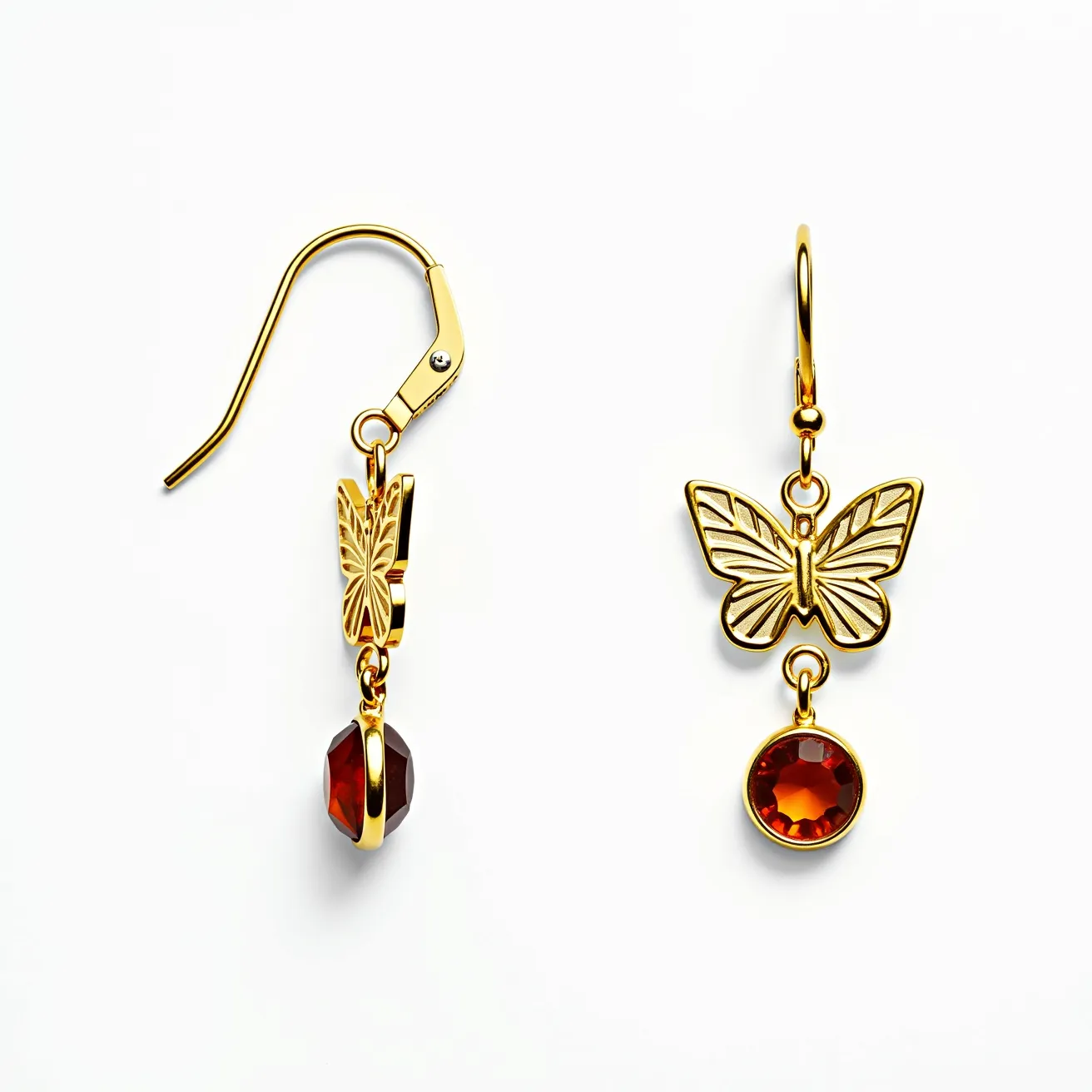 These thanksgiving earrings feature an elegant design with artful details. They are crafted from gold-toned metal, fashioned into intricate butterfly shapes, which add a whimsical and delicate touch. Below each butterfly, a warm, amber-colored gemstone is prominently displayed, showcasing a round brilliant cut that enhances its sparkle and depth. The stones are set in bezel settings, securing them safely while allowing maximum light exposure for added brilliance. The earrings use classic hook clasps for secure and comfortable wear, making them an ideal accessory for the Thanksgiving season.