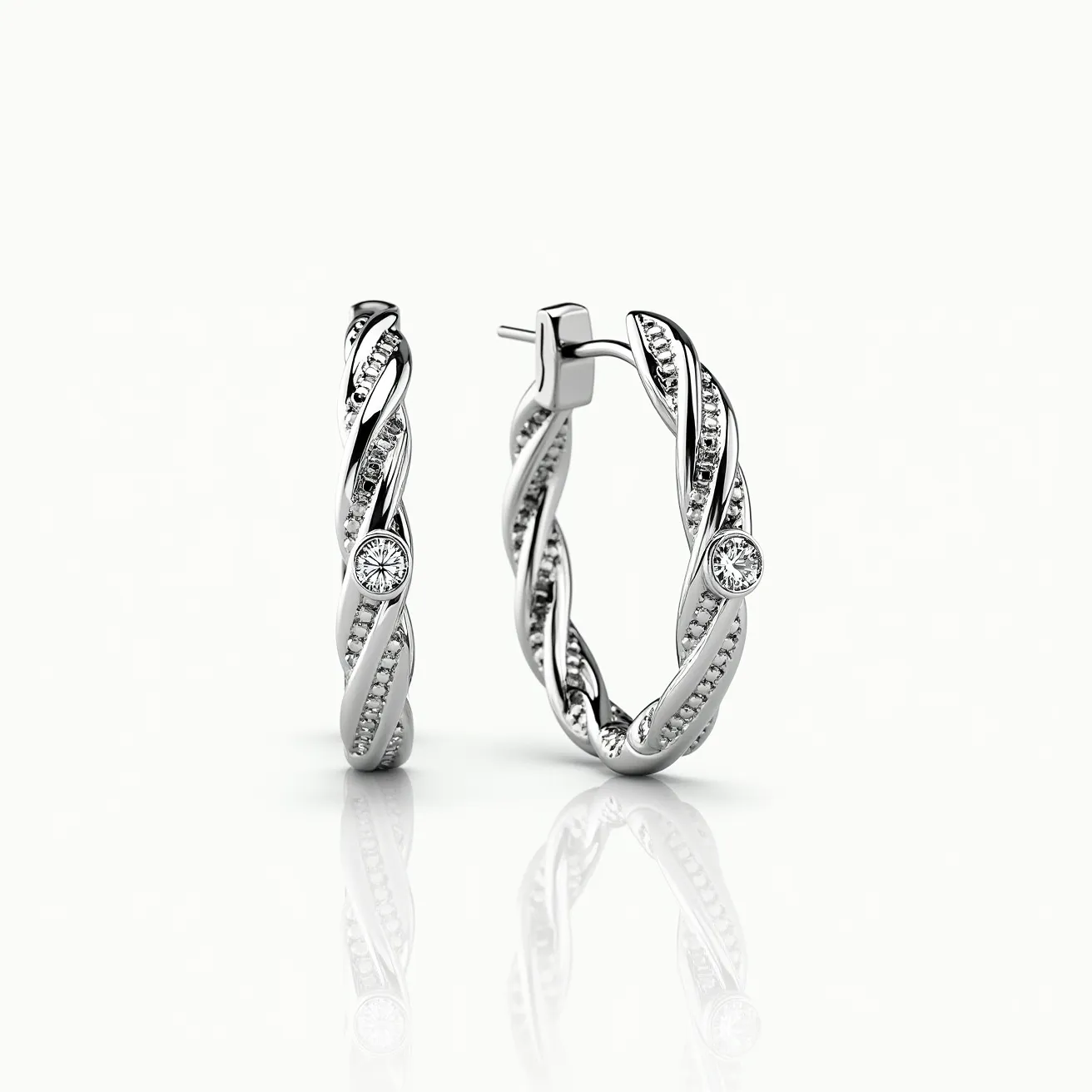 These twisted hoop earrings feature an intricate design crafted from polished metal, possibly silver or white gold, that spirals elegantly around the hoop. Adorned with small, round-cut gemstones, likely diamonds, the stones are securely embedded in a prong setting along the twisted surface. The earrings also showcase larger, bezel-set round stones at prominent intervals, adding a touch of brilliance and contrast. The earrings are equipped with a classic hinge clasp, ensuring they stay securely in place while worn, blending functionality with sophisticated design.