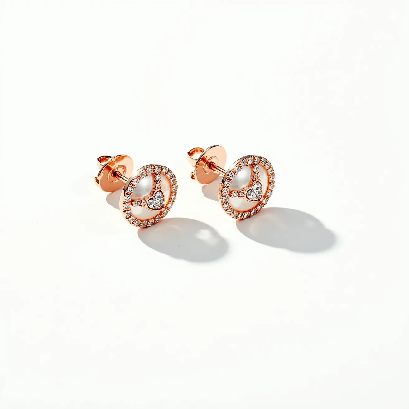 These valentines earrings are crafted with a charming design featuring rose gold-tone metal. They showcase a circular motif adorned with small, sparkling clear stones set in a pavé setting along the outer edge, adding a brilliant shimmer. At the center of each earring, there is a heart-shaped embellishment, also accented with tiny stones for added sparkle. The earrings are completed with a classic butterfly clasp, ensuring secure attachment when worn. Their elegant and romantic design makes them a fitting accessory for Valentine’s Day or any special occasion.