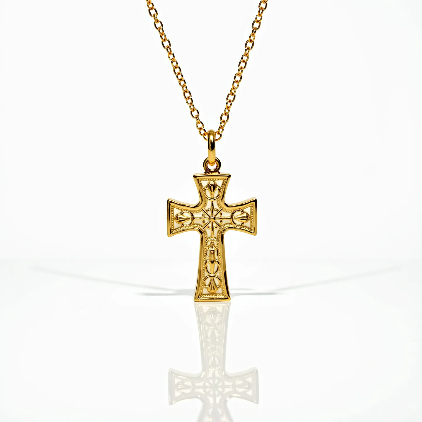 This baby cross necklace features a beautifully crafted cross pendant made of gold-colored metal, which exhibits intricate, embossed designs on its surface, adding a touch of elegance and sophistication. The pendant is attached to a fine, matching chain that completes the look with a polished appearance. The chain and pendant together create a harmonious design that is both delicate and stylish, suitable for a special occasion or as a meaningful keepsake.