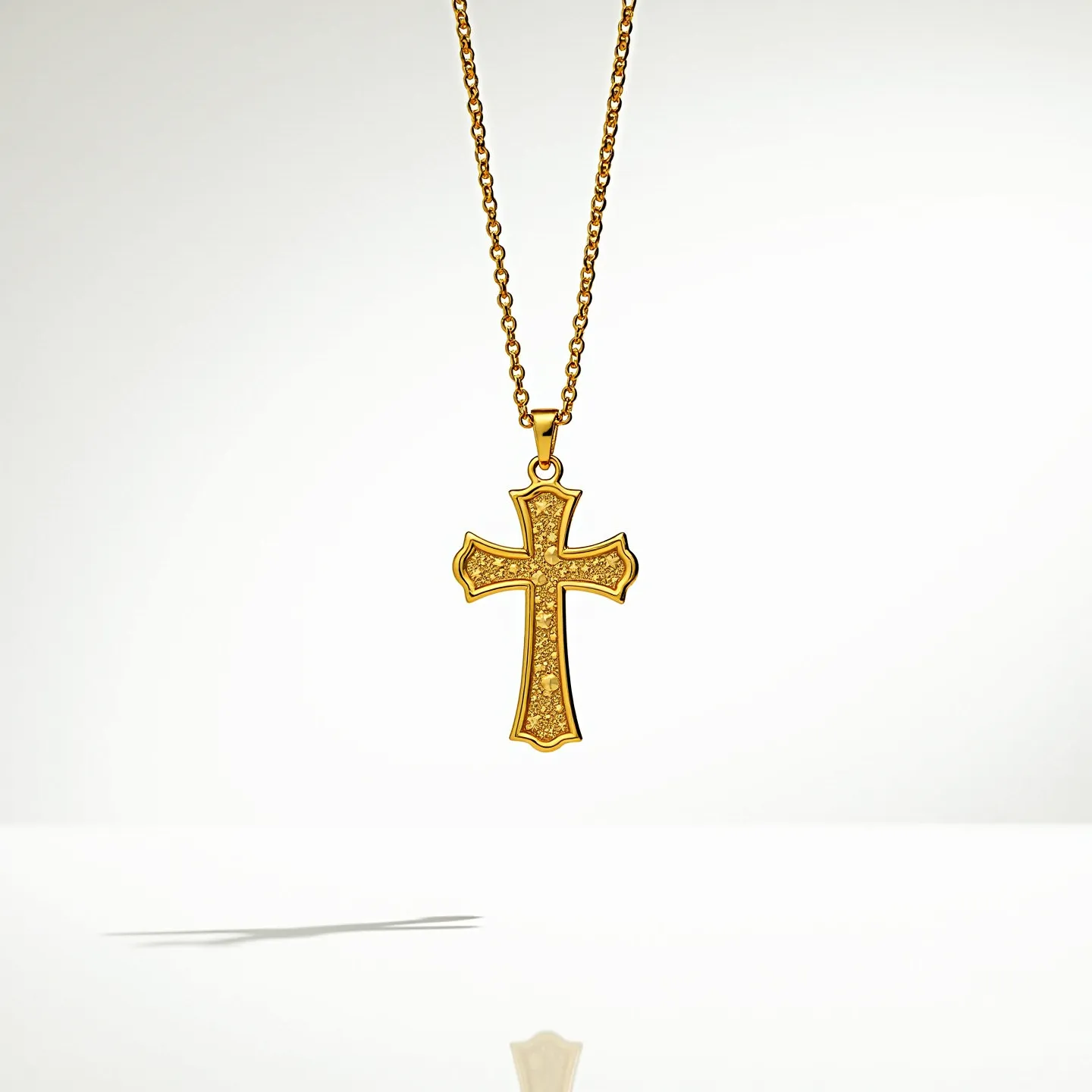 This baby cross necklace features a striking gold-colored cross pendant adorned with delicate sparkling gems, presenting a luxurious and refined appearance. The stones have a round cut, providing a classic and timeless brilliance. The gems are intricately set within the interior design of the cross, enhancing its ornate quality. The chain is a fine gold link design, suggesting both durability and elegance. The necklace is secured with a traditional spring ring clasp, ensuring ease of use while maintaining style and sophistication.