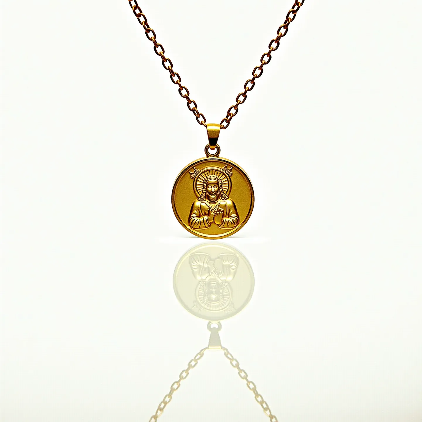 This catholic necklace features a gold-toned chain with a circular medallion. The medallion depicts a religious figure with intricate detailing, likely representing Jesus Christ, highlighted by a halo. The chain appears to be composed of interlinked oval links, adding a classic and durable quality to the piece. The medallion is seamlessly attached to the chain with a small loop, ensuring it hangs securely. The necklace exhibits a polished finish, enhancing its visual appeal and symbolizing its spiritual significance.