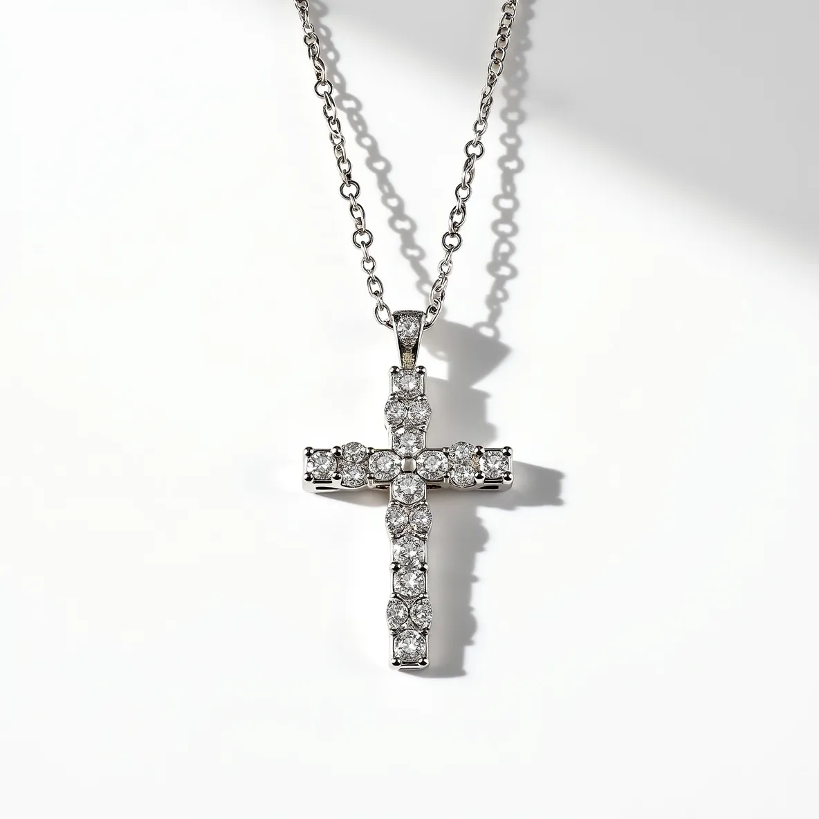 This cross diamond necklace features a sleek design with a polished metal cross adorned with numerous round-cut diamonds. The diamonds are set in a prong setting, enhancing their sparkle and ensuring they catch the light from various angles. The necklace appears to be crafted from a high-quality metal, likely white gold or platinum, contributing to its elegant and modern appearance. The chain is a simple yet refined link style, ensuring comfort and flexibility for the wearer. The attachment includes a classic lobster clasp, providing a secure closure while adding to the piece’s overall sophistication.