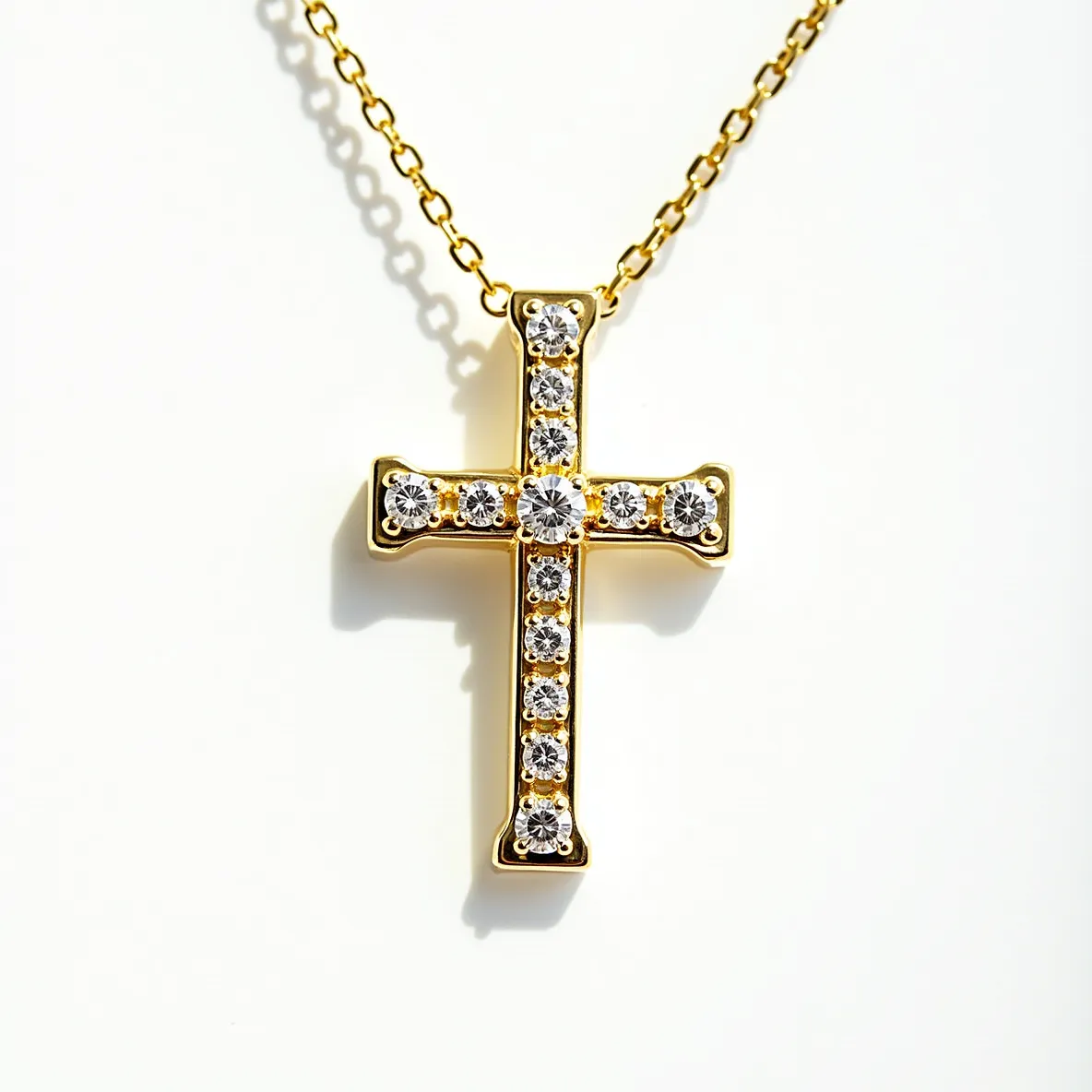 This cross diamond necklace features a striking pendant set with brilliant-cut diamonds placed in a classic yellow gold setting. The diamonds meticulously line the cross, each one secured in individual prong settings that allow for maximum light reflection and sparkle. The cross is suspended from a finely crafted gold chain, which adds to the necklace's elegant appearance. The necklace likely closes with a secure clasp, although the exact style of the clasp is not visible. Overall, the design combines the timeless motif of the cross with the luxury of gold and diamonds, making it both a statement piece and a symbol of faith.