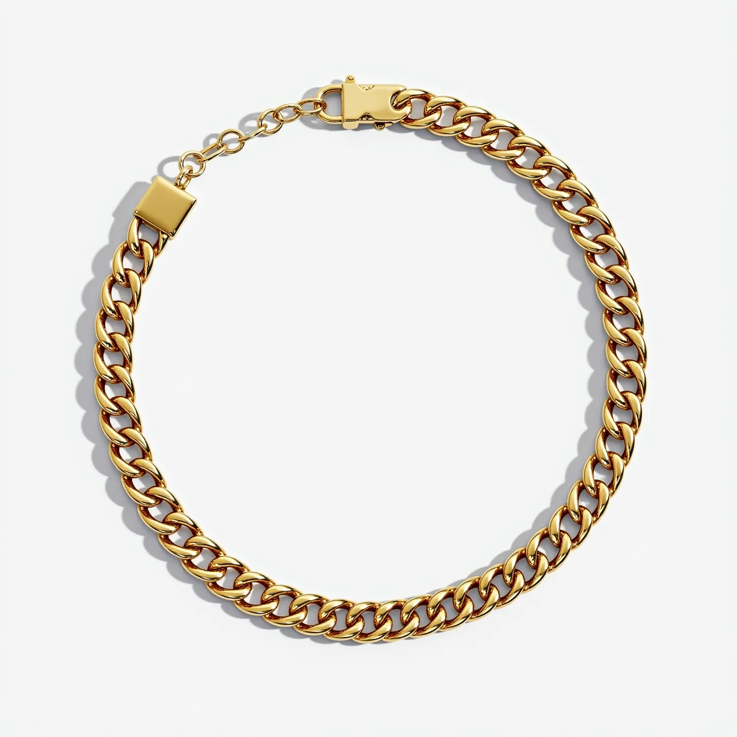 This curb chain is crafted from a polished gold-toned metal, giving it a sleek and elegant appearance. It features interlocking links that create a continuous and smooth pattern, characteristic of curbed chains. The chain is secured with a box clasp that provides a seamless and secure closure. These elements combine to create a classic and versatile piece of jewelry suitable for various occasions.