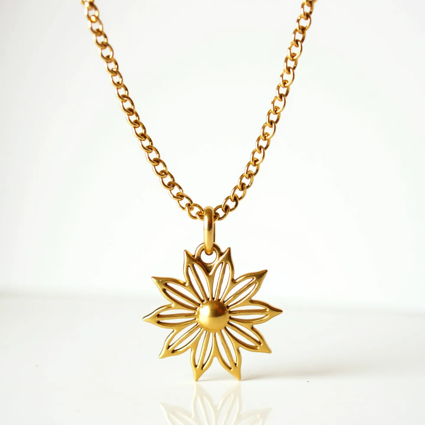 This custom charm necklace features a beautifully designed, gold-toned chain paired with a striking flower-shaped pendant. The pendant, crafted from a shiny gold material, is intricately fashioned to resemble an open-petaled flower with a polished, spherical center, offering a touch of elegance and finesse. Each petal is outlined precisely, providing a delicate and airy aesthetic to the overall piece. The charm hangs securely from a sturdy loop attached to the chain, which has a smooth finish and a classic link construction, ensuring durability and sophistication. The necklace is equipped with a standard clasp, allowing for easy wear and removal.