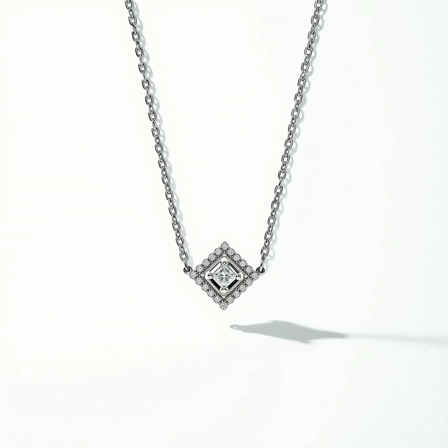 This diamond choker necklace features a delicate chain made of white metal, likely platinum or white gold, which gracefully supports a central diamond pendant. The pendant itself is crafted in a square shape, with a prominent central diamond cut to capture light effectively, possibly a princess cut, surrounded by a halo of smaller round brilliant diamonds, enhancing its sparkle and appeal. These gems are securely set in a prong setting, ensuring both visibility and protection. The necklace is minimal in its design, emphasizing elegance, and is fitted with a standard clasp that appears sturdy and secure, ideal for everyday wear or special occasions.