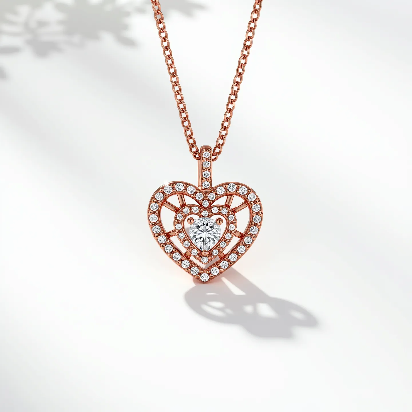 This diamond heart necklace features a delicate design crafted from a rose gold setting. The pendant showcases a dual-heart motif, with the outer heart intricately adorned with small, round-cut diamonds set in a pavé style, creating a continuous shimmer along the heart's shape. At the center, a prominent heart-shaped diamond is securely held in place with a prong setting, adding a brilliant focus to the piece. The chain, presumably made from the same rose gold material, connects seamlessly to the pendant and is likely secured with a classic lobster clasp, ensuring both style and functionality. Such a design beautifully marries elegance with a touch of romance, making it a timeless accessory.