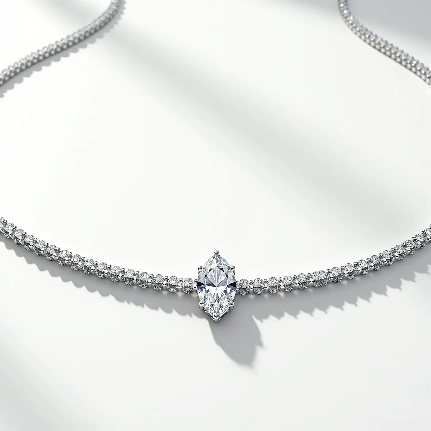 This diamond tennis necklace features a stunning array of round-cut diamonds set in a continuous line, highlighting their brilliance and uniformity. Each diamond is securely placed in a prong setting, which allows for maximum light reflection and showcases the stones' clarity and sparkle. The necklace is accentuated by a prominent marquise-cut diamond, centrally located and embraced by a similar prong setting, serving as an eye-catching focal point. The metal setting appears to be crafted from a lustrous white gold or platinum, enhancing the diamond's visual impact. A secure clasp is likely present, ensuring the necklace stays elegantly in place.