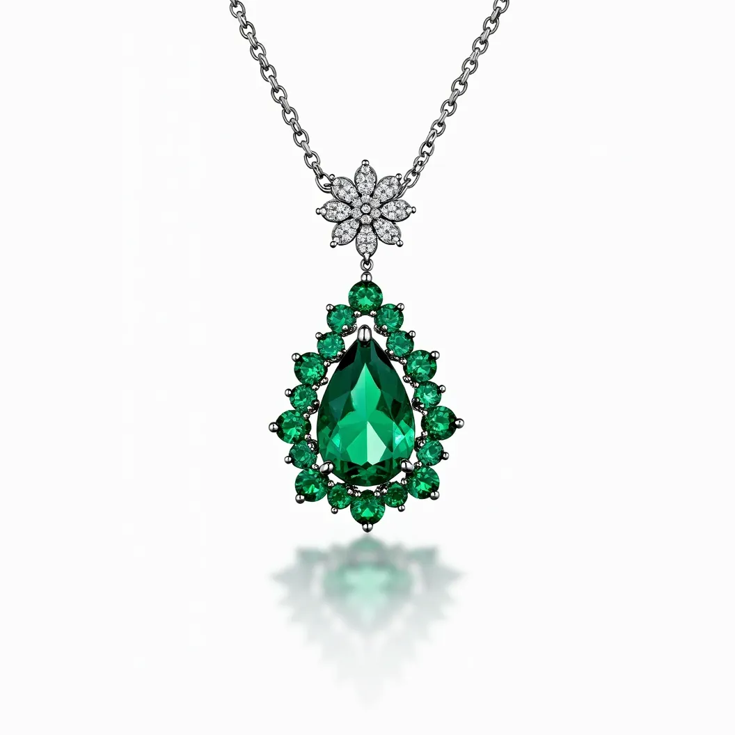 This emerald necklace features a striking pear-shaped emerald as its centerpiece, meticulously cut to enhance its vivid green hue. Surrounding the central gem are several smaller, round emeralds, set in a symmetrical arrangement that accentuates the necklace's elegance. The pendant is attached to a delicate chain by a floral motif made of white diamonds, each diamond carefully cut to reflect light and complement the rich green of the emeralds. The necklace is crafted with precious metal, likely white gold or platinum, offering durability and a luxurious sheen that balances the vibrant stones. The attachment and clasp are designed to ensure both security and ease of wear, harmonizing seamlessly with the overall sophisticated design of the piece.