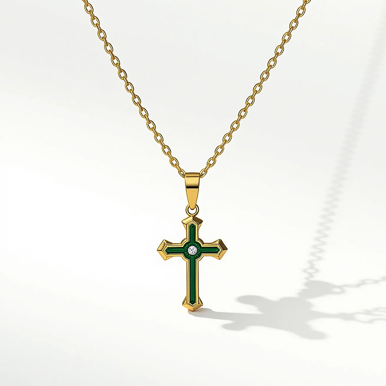 This faith necklace showcases a cross pendant crafted from a polished gold-toned metal, featuring rich green enamel inlay that adorns the surface, contributing to an elegant, yet striking appearance. At the center of the cross, a single round-cut gem is set, likely a diamond or similar stone, adding a subtle sparkle that complements the overall design. The pendant hangs from a matching gold-toned chain, which appears to be linked in a simple yet secure style. The necklace is finished with a standard clasp, ensuring both ease of wear and durability.