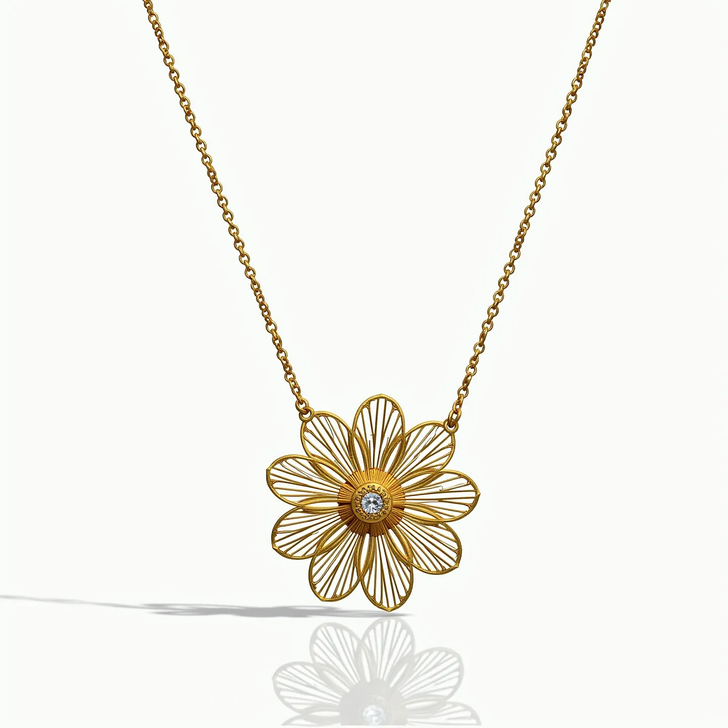 This flower necklace features an intricately designed pendant crafted from a golden metal, resembling a daisy-like bloom with openwork floral detailing. At the center of the flower sits a round, brilliant-cut gemstone, likely a diamond, securely held in place by a bezel setting that adds a touch of sparkle to the piece. The pendant is elegantly suspended from a delicate, matching chain, suggesting a seamless integration of the flower motif with its supporting structure. The necklace likely incorporates a standard clasp mechanism, typical of fine jewelry, ensuring both functionality and a secure fit.