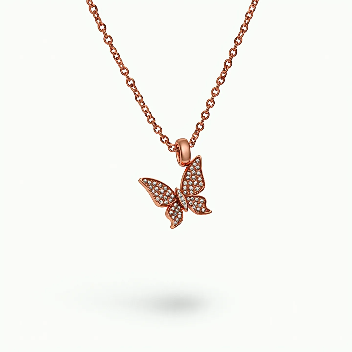 This girl's necklace features a rose gold chain that supports an intricately designed butterfly pendant. The butterfly is adorned with small, round-cut white stones, likely diamonds or cubic zirconia, which are set closely together to create a pavé effect, exuding a subtle sparkle. The pendant is attached to the chain by a polished bail that matches the rose gold hue of the chain and beautifully complements the stones' brilliance. The overall design is elegant and feminine, suitable for both everyday wear and special occasions.