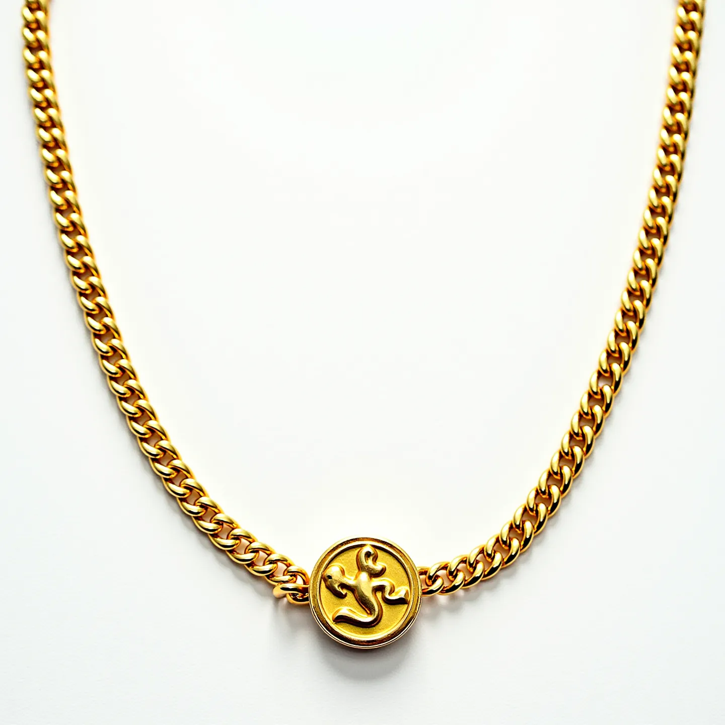 This gold chain features a sturdy, tightly interlinked design, giving it a robust yet elegant appearance. The central medallion is round and prominently showcases the "Om" symbol, crafted in the same gold-tone as the chain itself. This centerpiece adds a spiritual and cultural element to the design. The chain is likely made of gold or gold-plated material, providing a rich and uniform color throughout. No additional stones or gems are visible on the chain, and the clasp is not shown, suggesting it may be integrated or concealed within the design or hidden from view in the image.