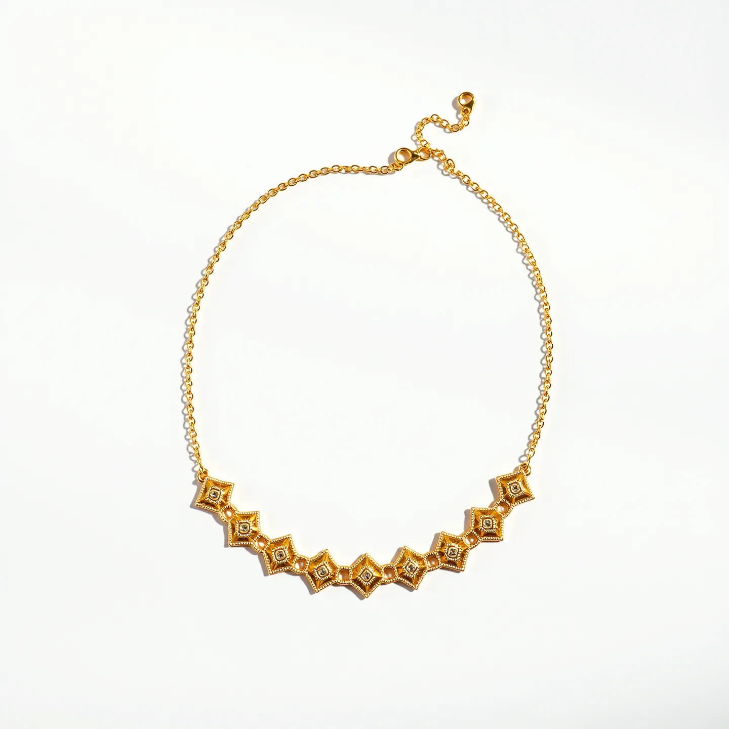 This gold choker necklace features an intricate design with a sequence of geometric motifs that resemble stars or flowers, each set with a small gem at the center. The necklace is crafted from gold, highlighting a rich and luxurious hue. The gems are round in shape, possibly set in a bezel to ensure a secure fit while accentuating their brilliance. It is completed with a delicate chain that connects to an adjustable clasp, allowing for a customized fit. The overall appearance conveys elegance and meticulous craftsmanship, making it a standout piece suitable for various occasions.