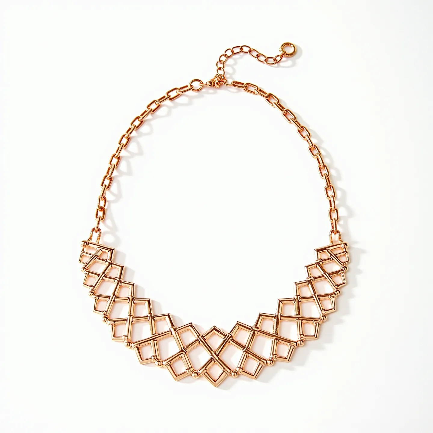 This gold choker necklace features an intricate geometric design composed of interlocking diamond-shaped links, creating a visually appealing pattern. The necklace is crafted from a gold-toned metal, lending it a warm and luxurious appearance. Small, spherical beads accentuate the junctions of the diamond shapes, adding subtle detailing to the overall composition. The choker is secured with a classic lobster clasp, accompanied by a short length of chain that allows for adjustable sizing, ensuring a comfortable fit around the neck. Its contemporary yet elegant design makes it a standout accessory for various occasions.