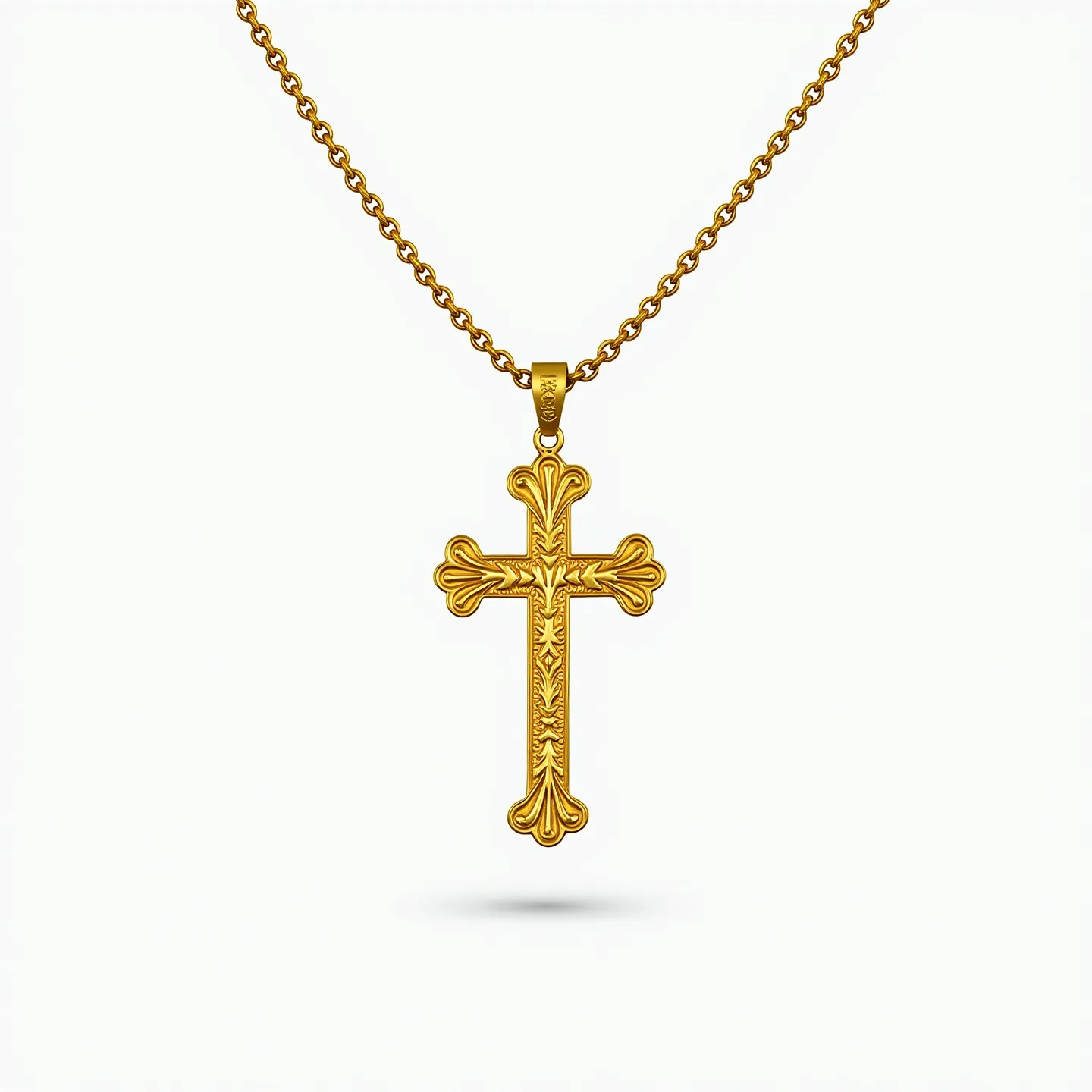 This gold cross necklace showcases an intricately designed pendant crafted from gold, featuring ornate detailing that adds to its visual appeal. The surface of the cross is embellished with floral patterns that indicate fine craftsmanship. The chain is composed of interlocking gold links, providing a classic and elegant appearance. The pendant attaches to the chain via a polished gold bail that complements the overall design. This necklace embodies a combination of elegance and traditional charm through its detailed gold work.