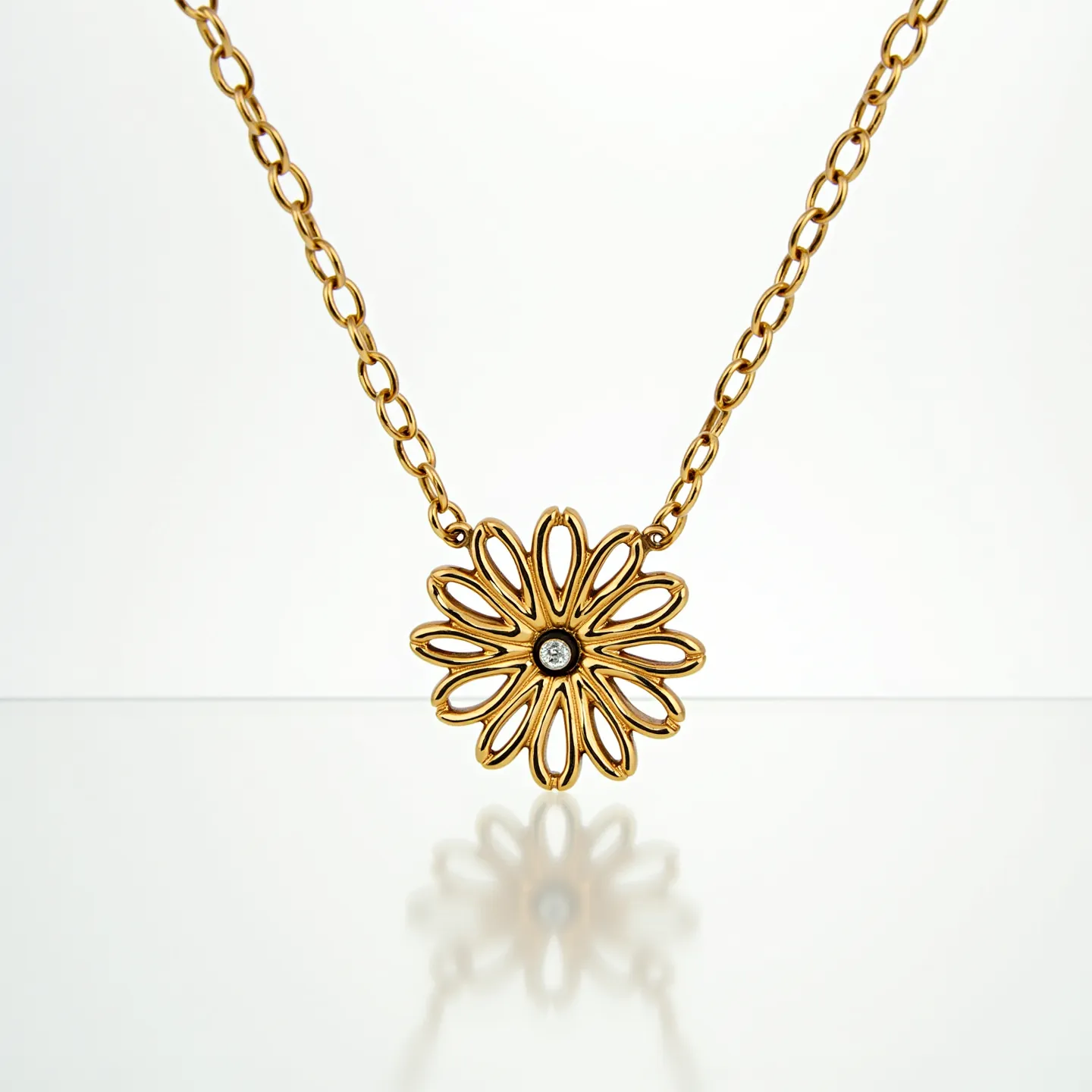 This gold flower necklace features a delicate chain that supports an intricate flower pendant crafted from gold. At the center of the flower is a sparkling round gem, possibly a diamond, which is set in a simple bezel setting, enhancing the elegance of the design. The flower design is composed of openwork petals, adding a sense of lightness and complexity to the piece. The necklace likely uses a standard clasp to ensure secure wear, blending seamlessly with the overall refined appearance of the accessory.