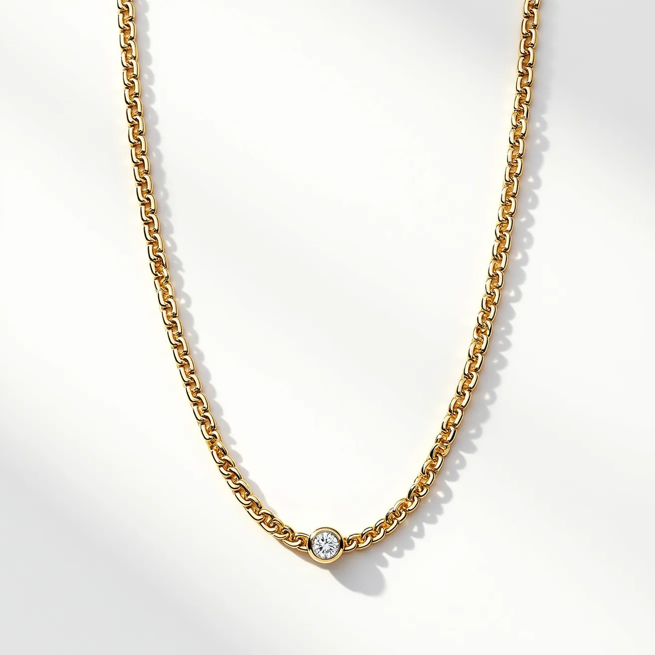 This gold link necklace features a chain crafted from gold with interlocking links that give it a classic and elegant appearance. At the center of the necklace is a single round gemstone, likely a diamond, set in a bezel setting that provides a secure and sleek display. The necklace includes a clasp for easy fastening, ensuring both functionality and style. The overall design of the necklace combines the timeless appeal of gold with the subtle sparkle of the gem, making it a versatile accessory.