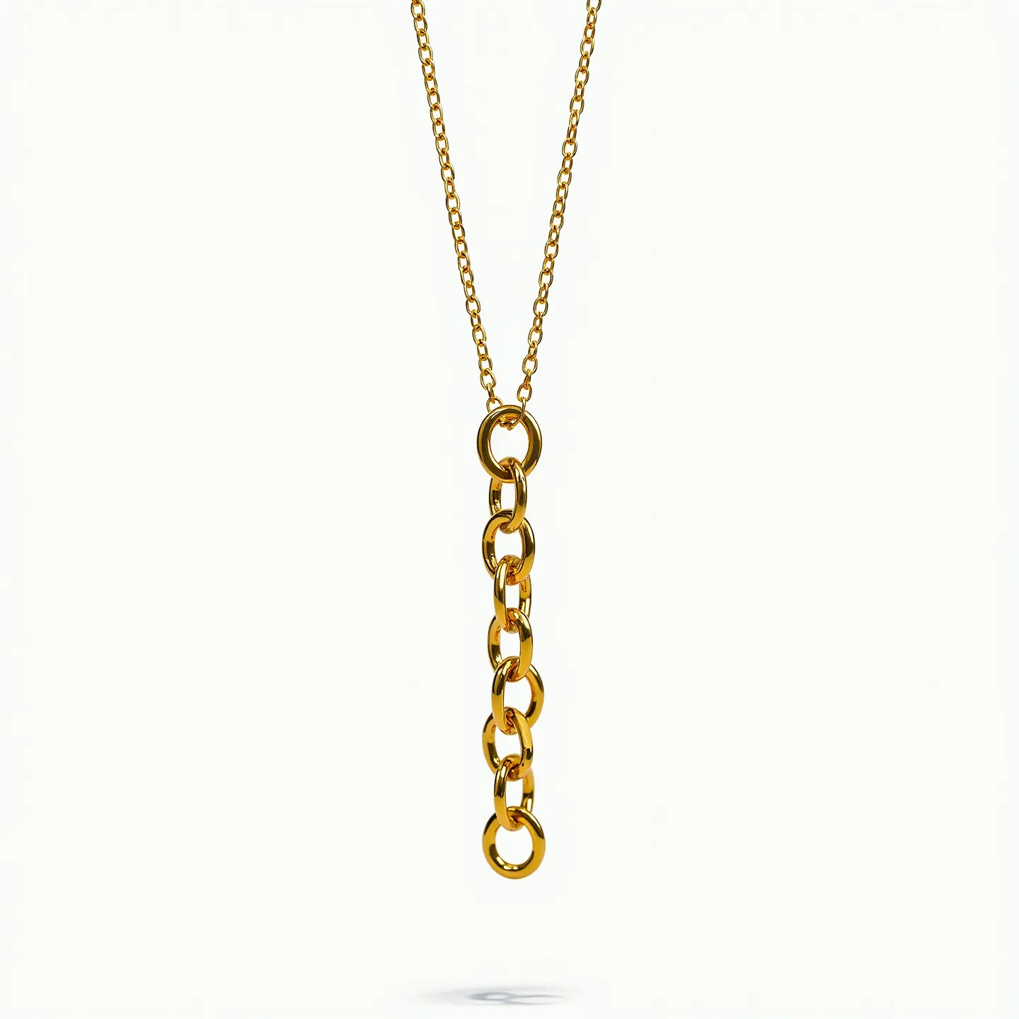 This gold link necklace features a series of polished, round links that form a striking and classic chain. The links are uniform in size, showcasing a seamless design without any gemstones. The necklace has a simple yet elegant appearance, with the gold material providing a rich, warm luster. At the top, there is a delicate chain transitioning into the larger linked section, adding a subtle contrast in design. The clasp, though not visible, is likely to be a standard spring ring or lobster claw, ensuring security and ease of use.