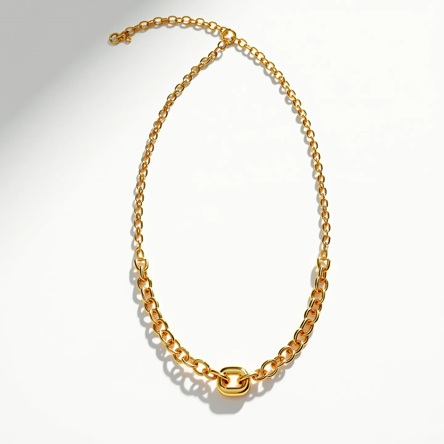 This gold link necklace features a series of polished interlocking links that give it an elegant and classic design. The material appears to be gold, which provides a lustrous and luxurious finish. At the center of the necklace, there is a prominent oval-shaped link that adds a subtle focal point to the piece. The necklace is equipped with a simple clasp mechanism, allowing for easy fastening and secure wear. Overall, this necklace exudes a timeless appeal with its well-crafted gold links and understated yet stylish design.