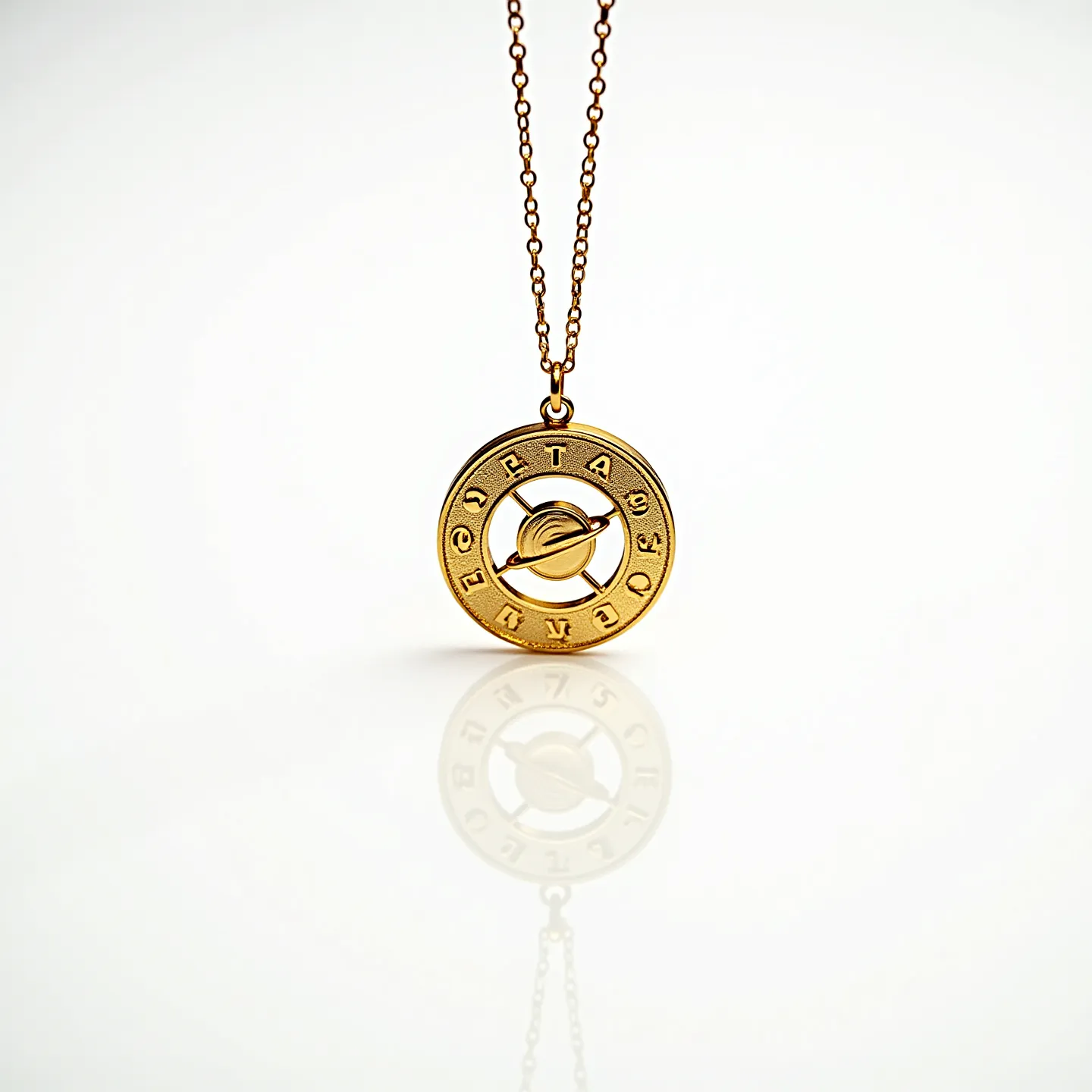 This gold medallion necklace features a circular pendant adorned with engraved symbols around its perimeter. The medallion itself is crafted from gold, lending it a luxurious and classic appearance. At the center, there's an intricate design depicting what appears to be a small, stylized planet with rings, contributing an element of unique charm and sophistication. The necklace is connected by a fine link chain, allowing it to drape elegantly. The clasp appears to be a standard lobster clasp, ensuring secure wear and easy fastening. Overall, the necklace combines elegance with a touch of artistic flair.