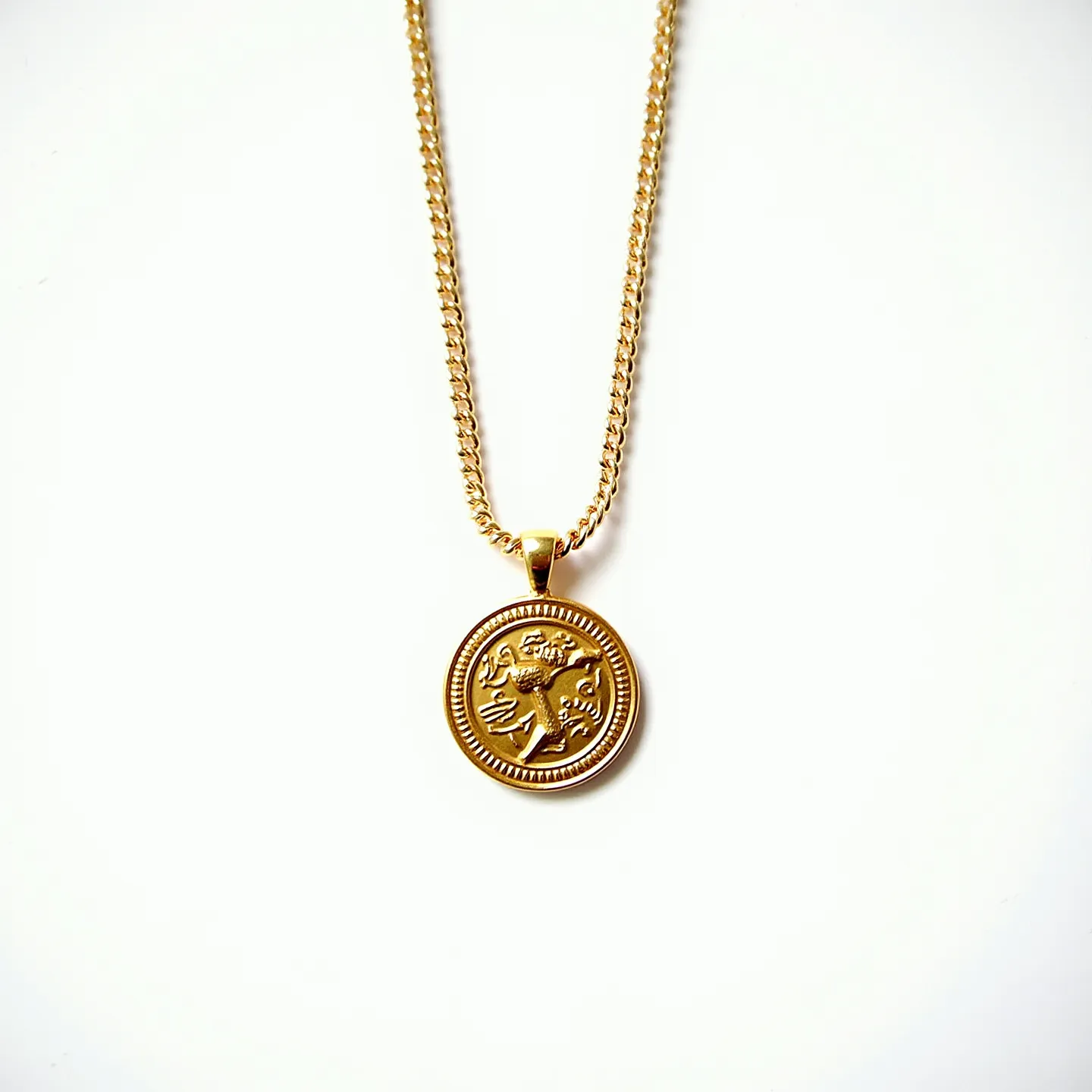 This gold medallion necklace features a detailed round pendant crafted from gold, showcasing a raised design that adds an artistic touch. The medallion hangs from a finely linked gold chain, which complements the pendant seamlessly. The pendant is smooth and appears to be polished, lending a refined and elegant appearance to the piece. The chain is likely secured with a standard clasp, providing both functionality and security. The overall design reflects classic style and sophistication, making it versatile for various occasions.