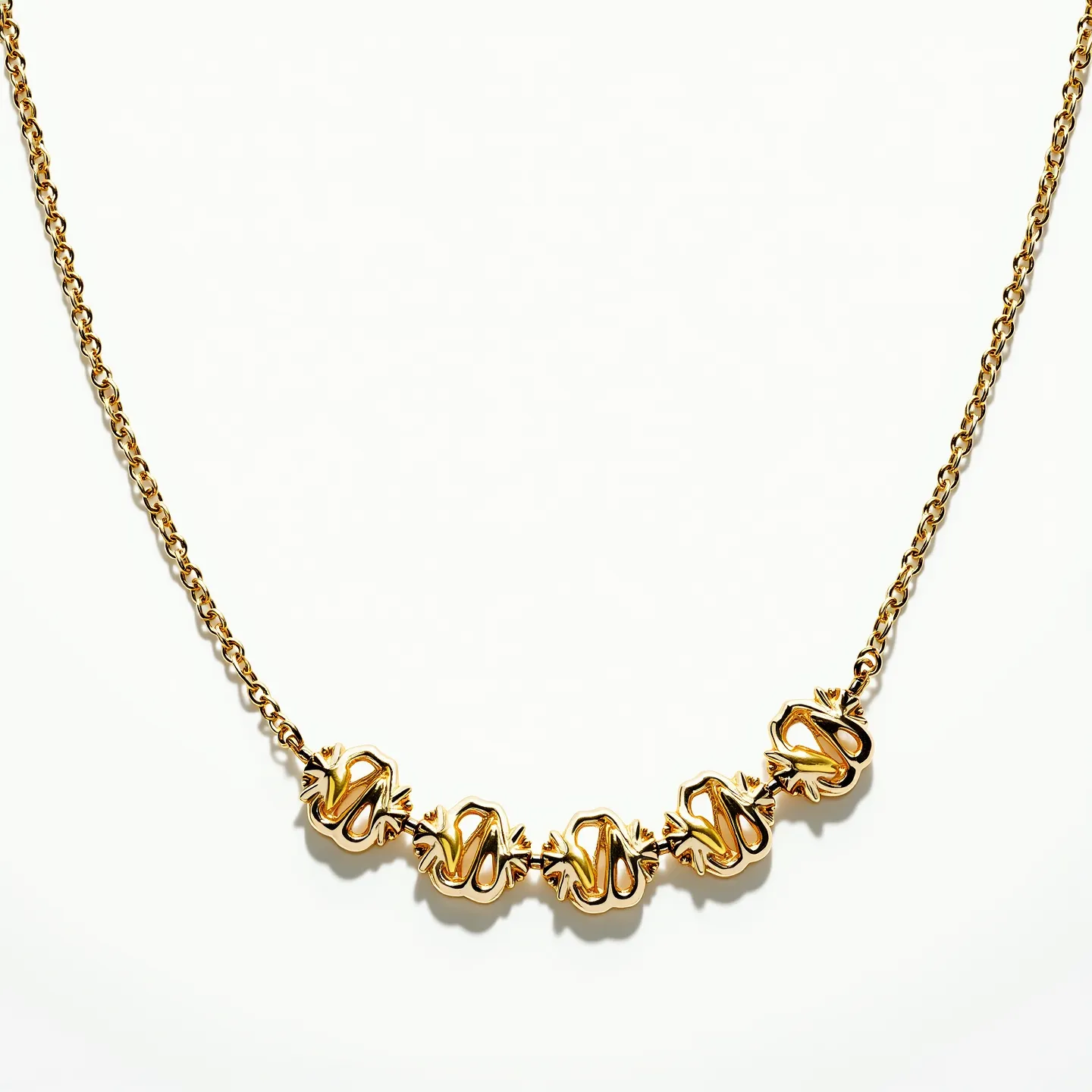 This gold necklace features a series of intricately designed links that form the central decorative element. The gold links have a sculpted, ornate appearance, resembling twisted and looped motifs, possibly inspired by natural or abstract forms. The necklace chain consists of uniform, small links that contribute to a classic and elegant look. No visible gemstones or additional materials are incorporated into the design, maintaining a cohesive gold aesthetic. The attachment mechanism is not prominently visible in the image, but it typically includes a clasp for securing the necklace.