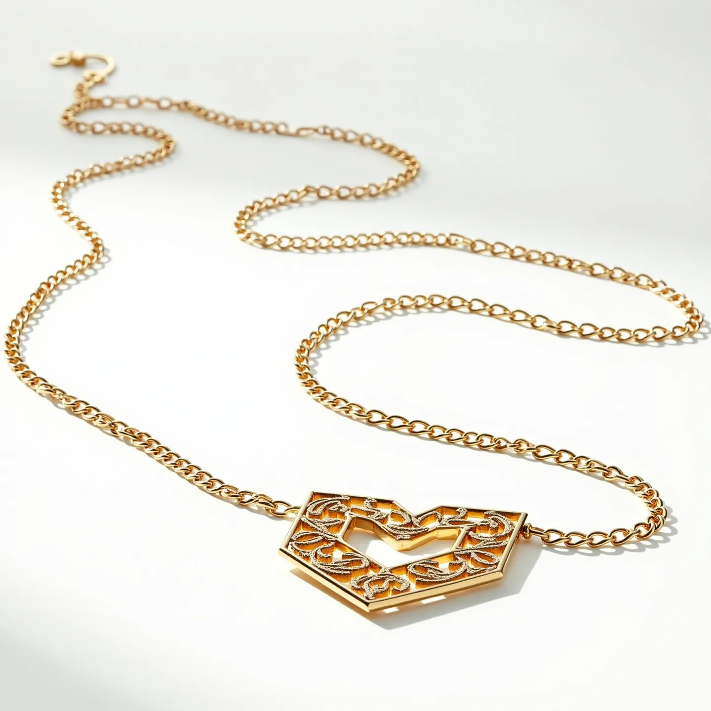 This gold rope necklace features a delicate chain made of gold-colored links, elegantly intertwined to form a classic rope pattern. At its center, a distinctive geometric pendant showcases intricate detailing with a cut-out design, offering a modern touch to the traditional necklace. The pendant adds a sophisticated focal point to the piece, drawing attention to its artistic craftsmanship. The necklace is equipped with a sleek, functional clasp, ensuring both security and ease of wear, making it a refined choice for various occasions.