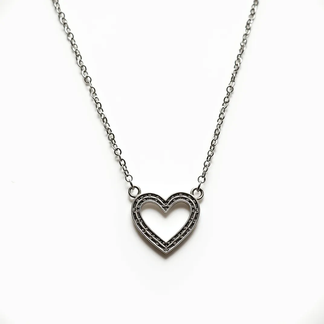 This heart necklace features a delicate, open-heart pendant that is encrusted with small, round, black stones, giving it a sparkling appearance. The stones are meticulously set along the edge of the heart in a pave setting, which enhances their brilliance. The necklace is crafted from a silver-toned metal that adds a sleek and modern touch to the design. The chain is composed of small, round links that complement the pendant and attach to it seamlessly via two small loops on either side of the heart. The necklace likely includes a standard clasp, ensuring secure and comfortable wear.