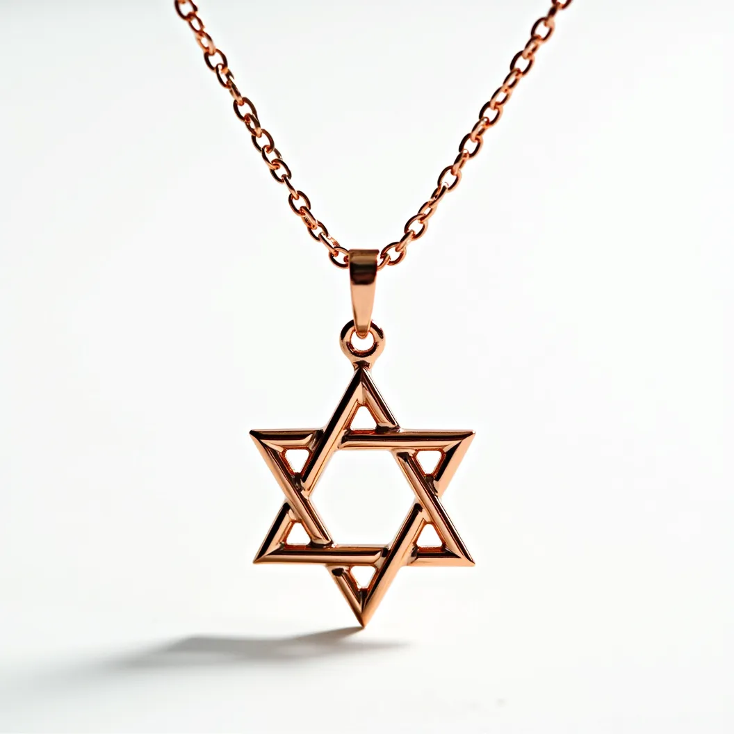 This Jewish star necklace features a delicately crafted Star of David pendant, made from a polished metal with a gold-tone finish that highlights its elegant simplicity. The interlocking triangles create a striking geometric pattern, and the pendant attaches to a matching chain via a small bail. The chain is composed of links in a uniform style, and the necklace is equipped with a lobster clasp, providing a secure and functional closure. The overall design is minimal and sophisticated, emphasizing the symbolic significance of the star.